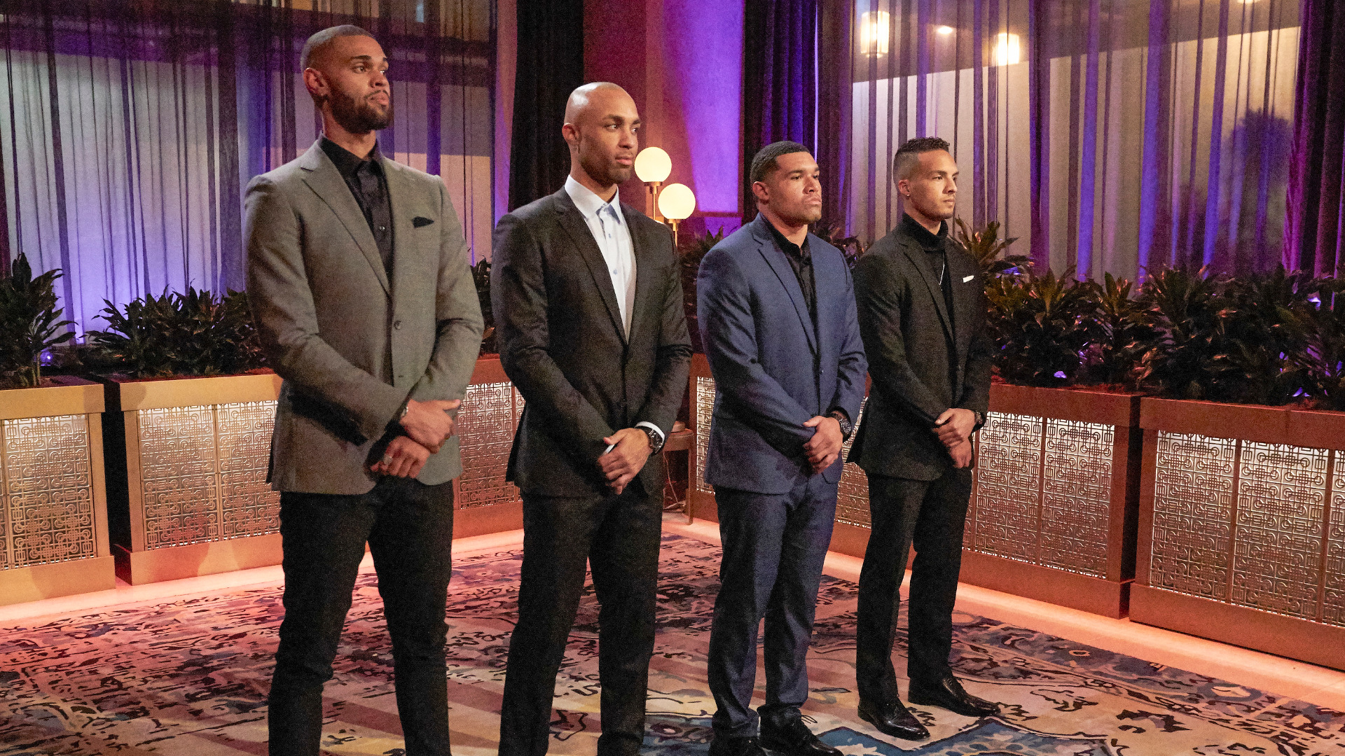 Nayte Olukoya, Joe Coleman, Rodney Mathews, and Brandon Jones stand in front of Michelle Young before the final four rose ceremony in ‘The Bachelorette’ Season 18 Episode 7