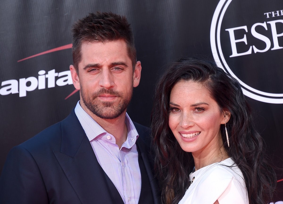 Olivia Munn and Aaron Rodgers pose together on the red carpet at the 2016 ESPYS