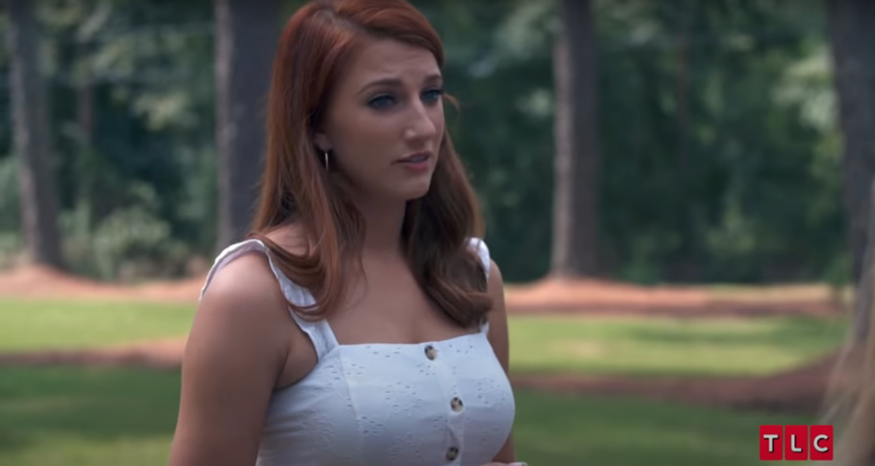 Olivia Plath, wearing a white tank top, in the 'Welcome to Plathville' Season 3 finale