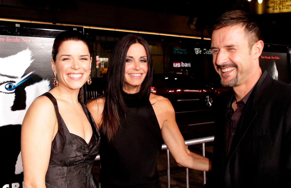 Neve Campbell, Courteney Cox, David Arquette of the original 'Scream' movie wearing black