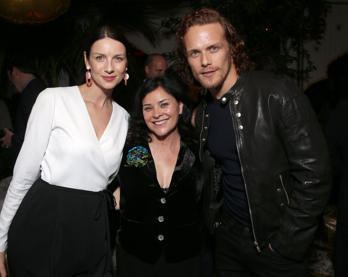 Outlander Diana Gabaldon and Caitriona Balfe and Sam Heughan attend the Starz Pre-Golden Globe Celebration at Chateau Marmont on January 8, 2016 in Los Angeles, California.