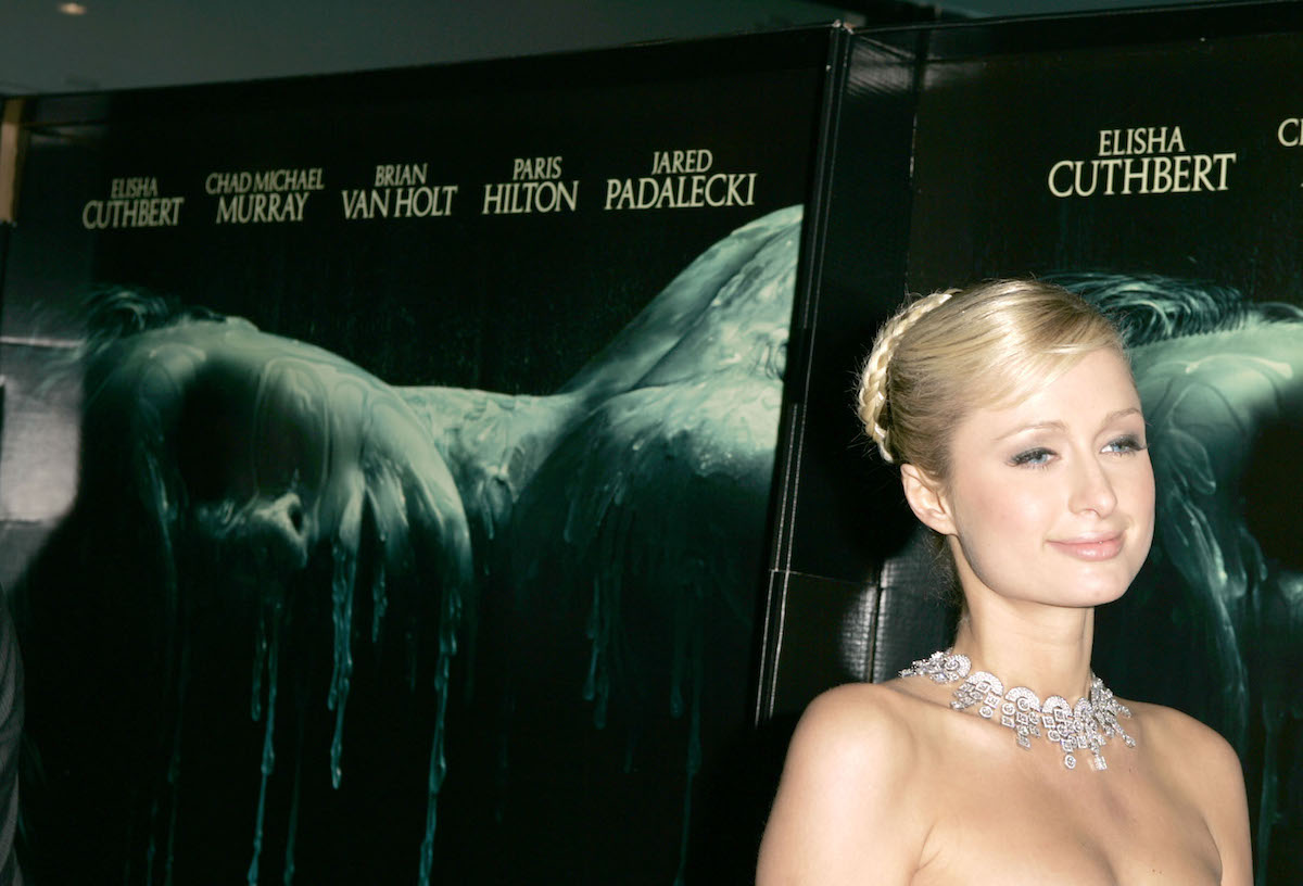Paris Hilton on the red carpet for 2005 'House of Wax' movie with large necklace