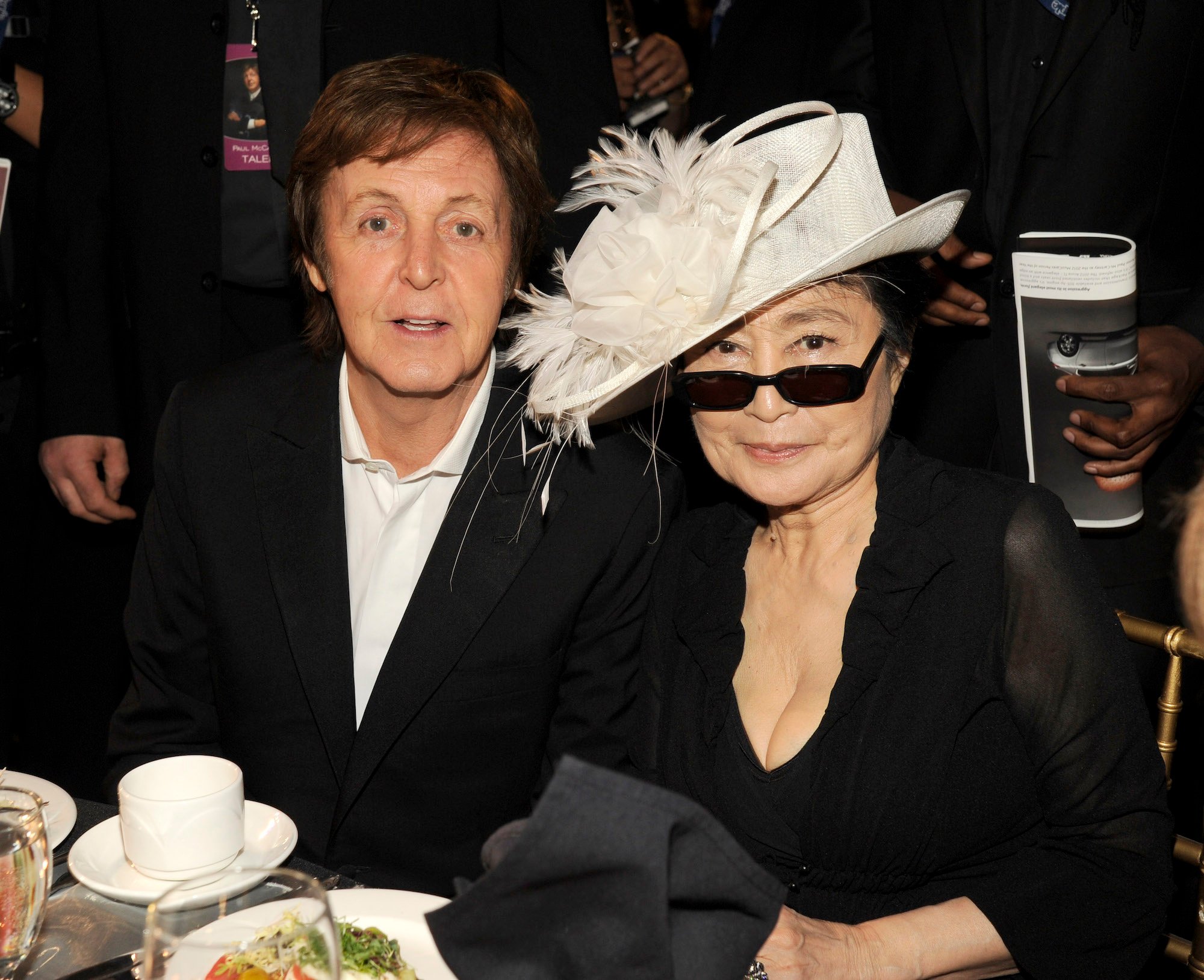 Paul McCartney and Yoko Ono sit together at the 2012 MusiCares gala honoring the Beatles singer/songwriter