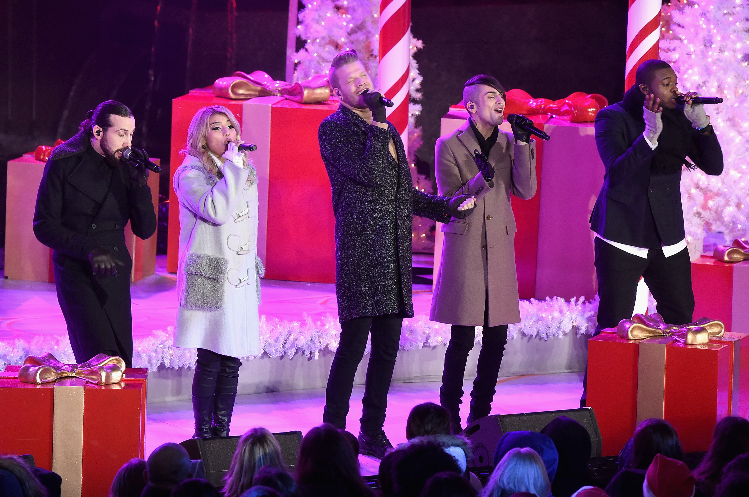 Pentatonix members Avi Kaplan, Kirstie Maldonado, Scott Hoying, Mitch Grassi, and Kevin Olusola perform on stage during the 83rd Rockefeller Center Tree Lighting