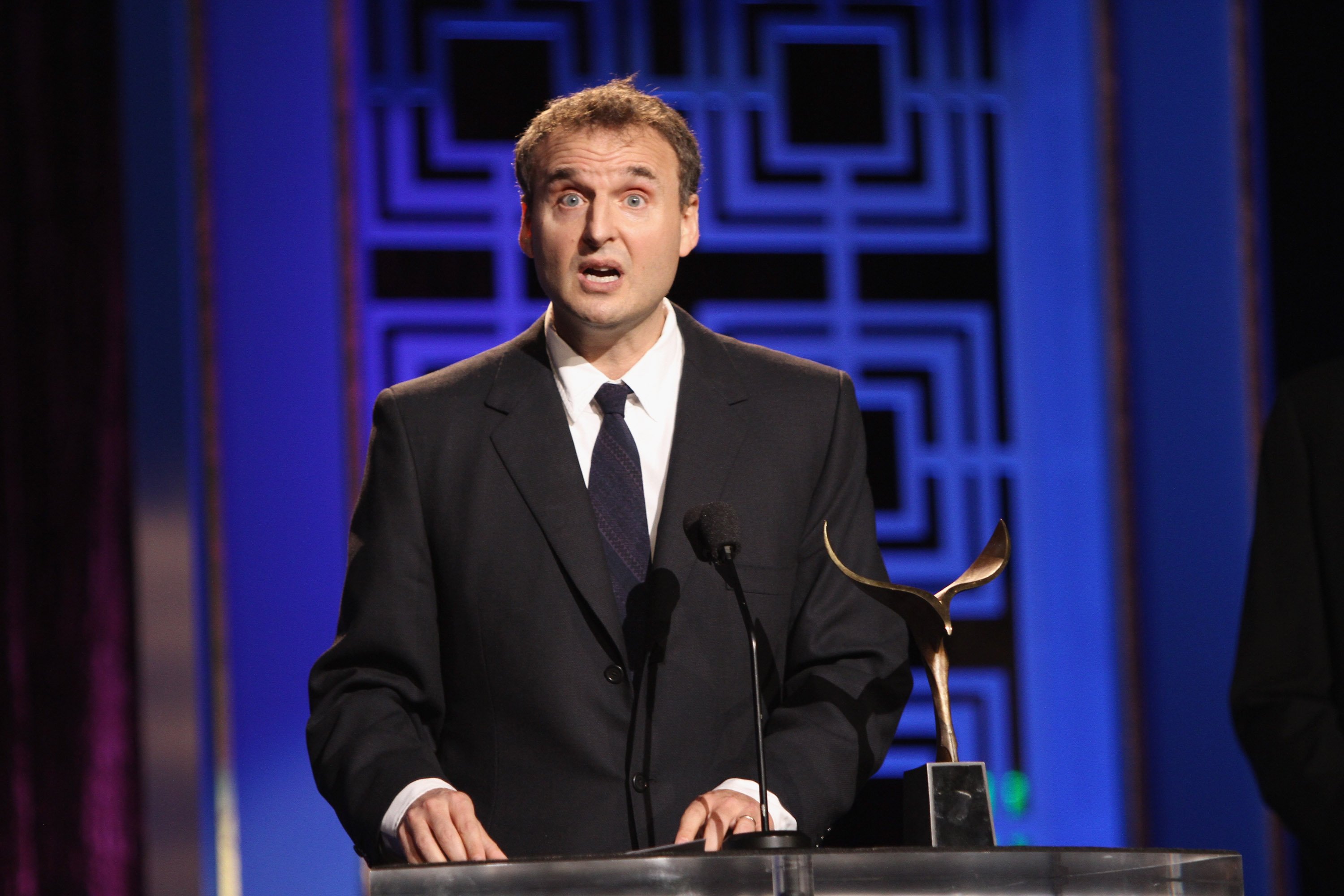 Phil Rosenthal accepts the Writers Guild Valentines Davies Award onstage during the 2013 WGAw Writers Guild Awards at JW Marriott Los Angeles. Rosenthal is best known as the creator and writer for 'Everybody Loves Raymond'