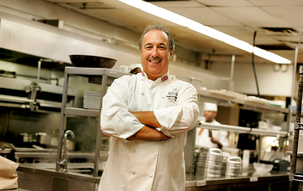 Photo of Princess Diana's former personal chef Darren McGrady smiling as he promote his cookbook