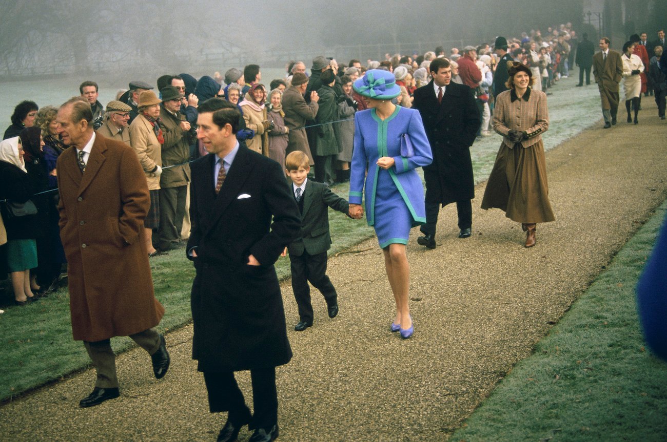 Prince Philip, Prince Charles, Prince Harry, Princess Diana, Princ Andrew, and Sarah Ferguson walk in pairs on Christmas Day, 1991