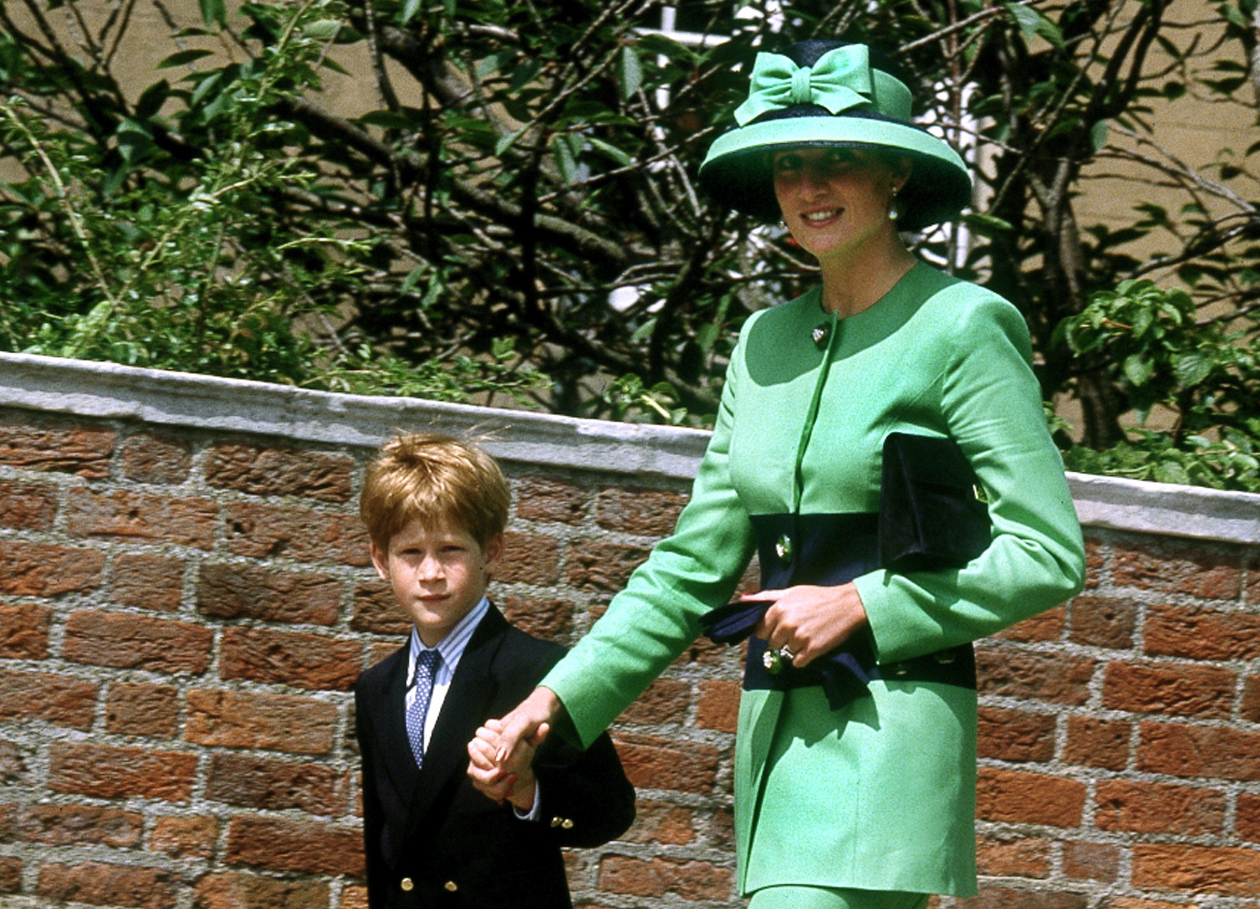Princess Diana and her son Prince Harry arriving at Windsor Chapel for a wedding in 1992