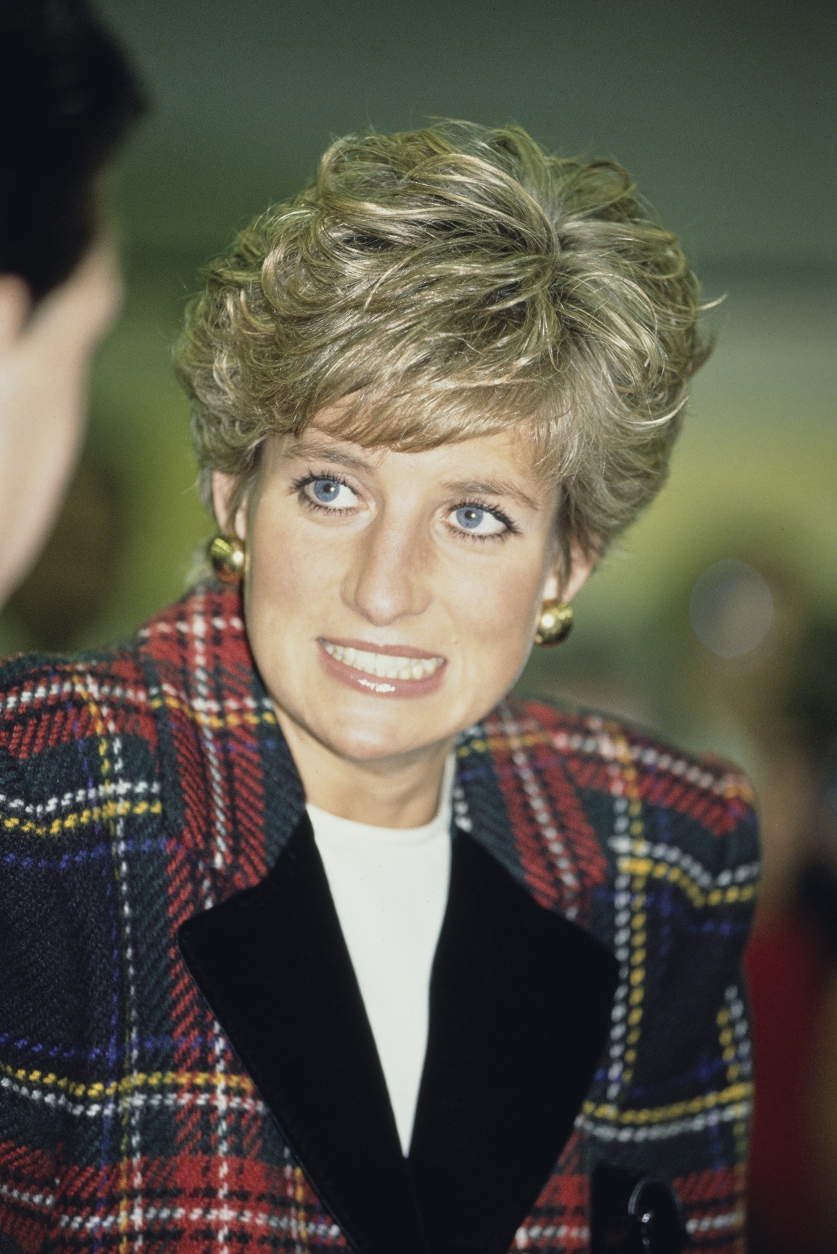 Princess Diana pictured in a plaid coat during a visit to Cornwall in 1991