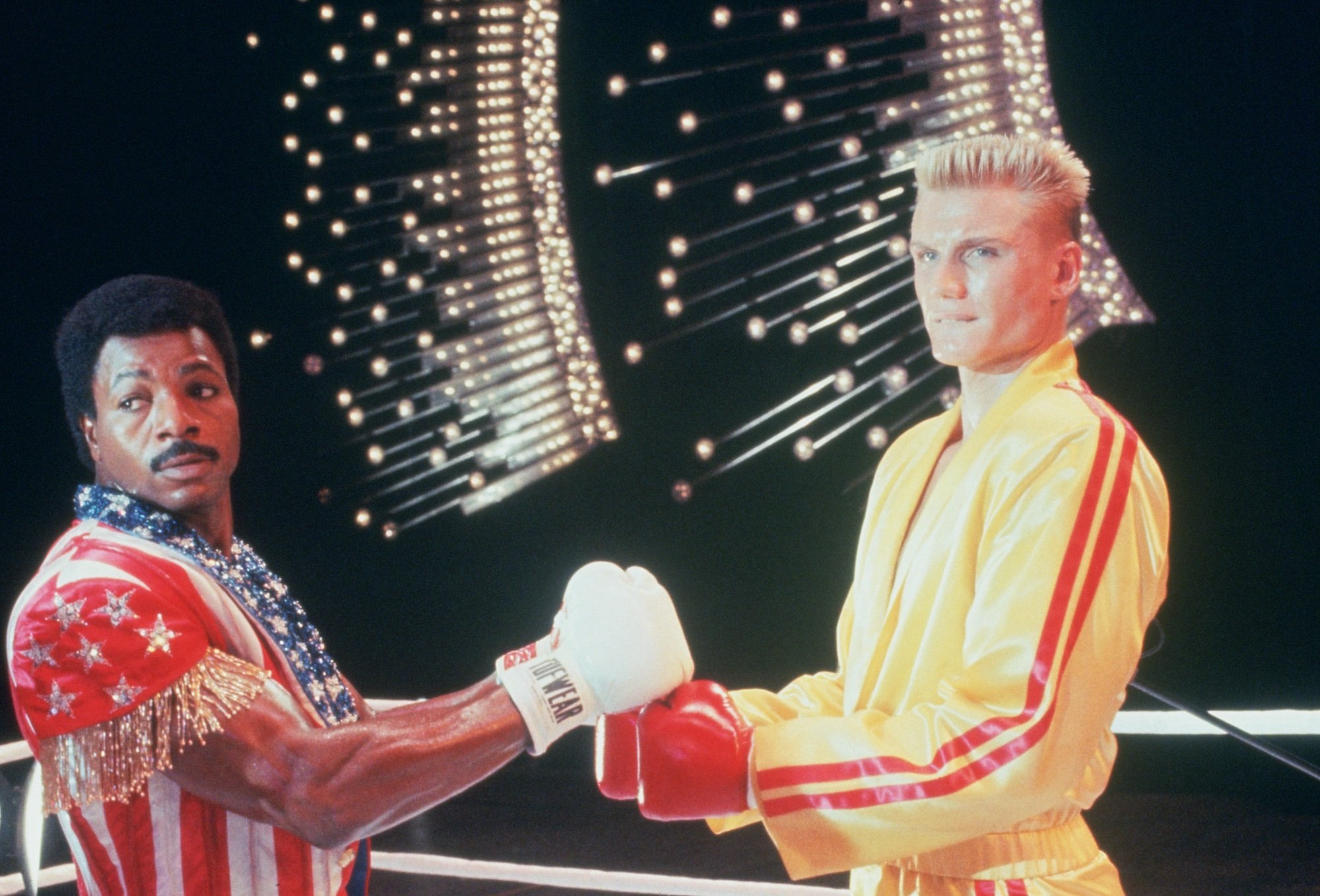 Rocky IV: Carl Weathers and Dolph Lundgren touch gloves