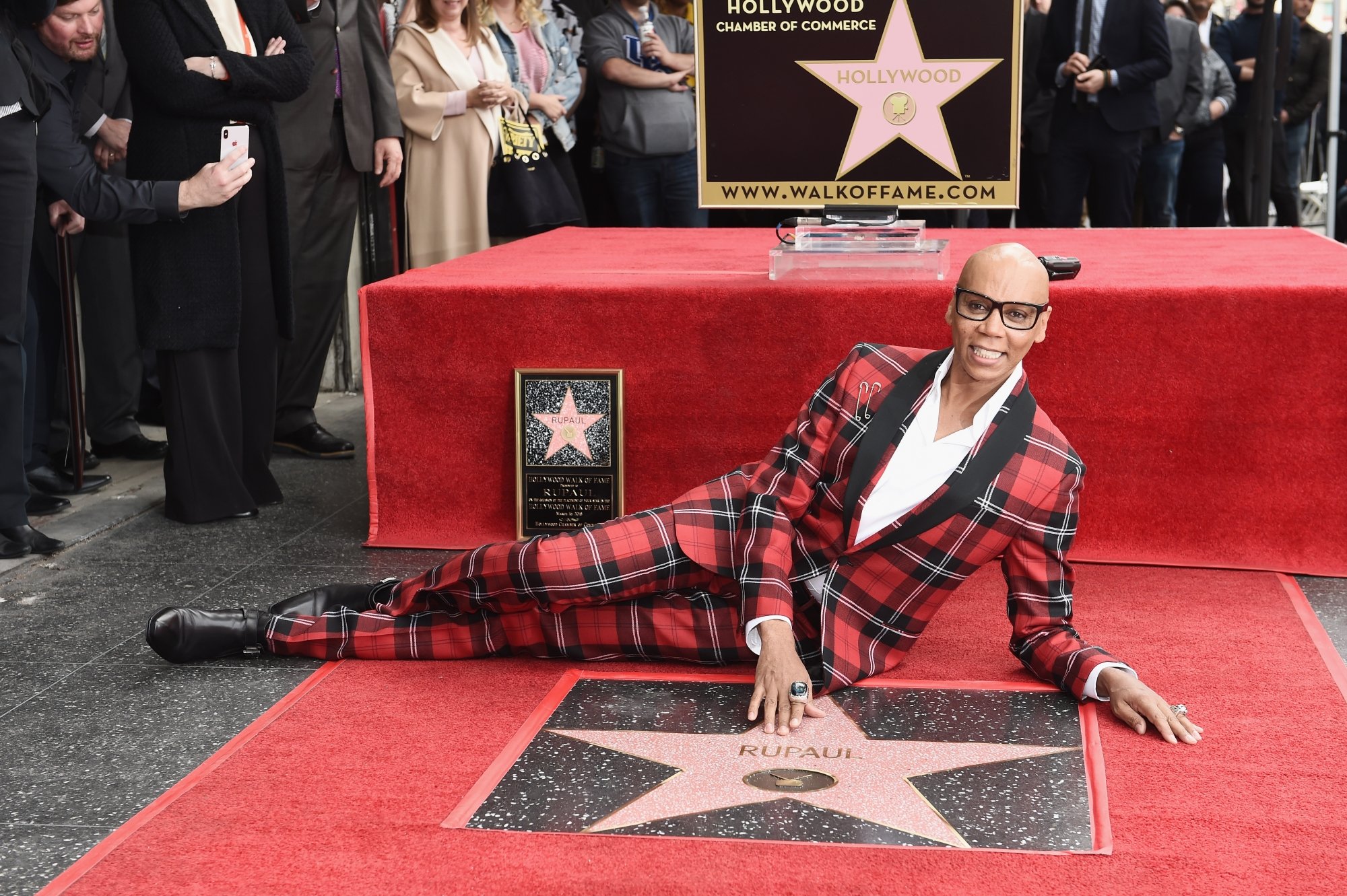 'RuPaul's Drag Race' host RuPaul laying down in front of Hollywood star