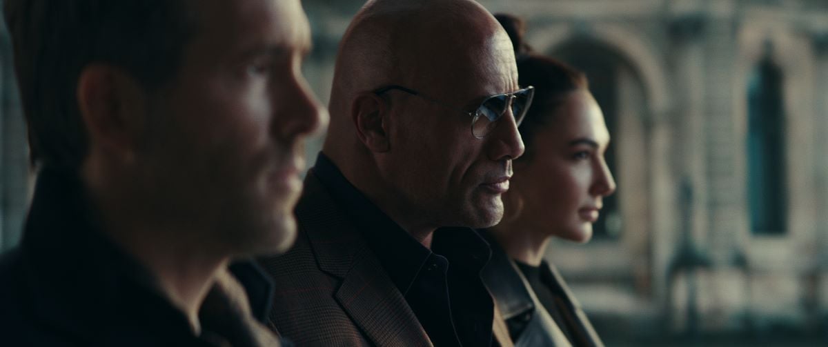 Ryan Reynolds as Nolan Booth, Dwayne Johnson as John Hartley and Gal Gadot as The Bishop in 'Red Notice'