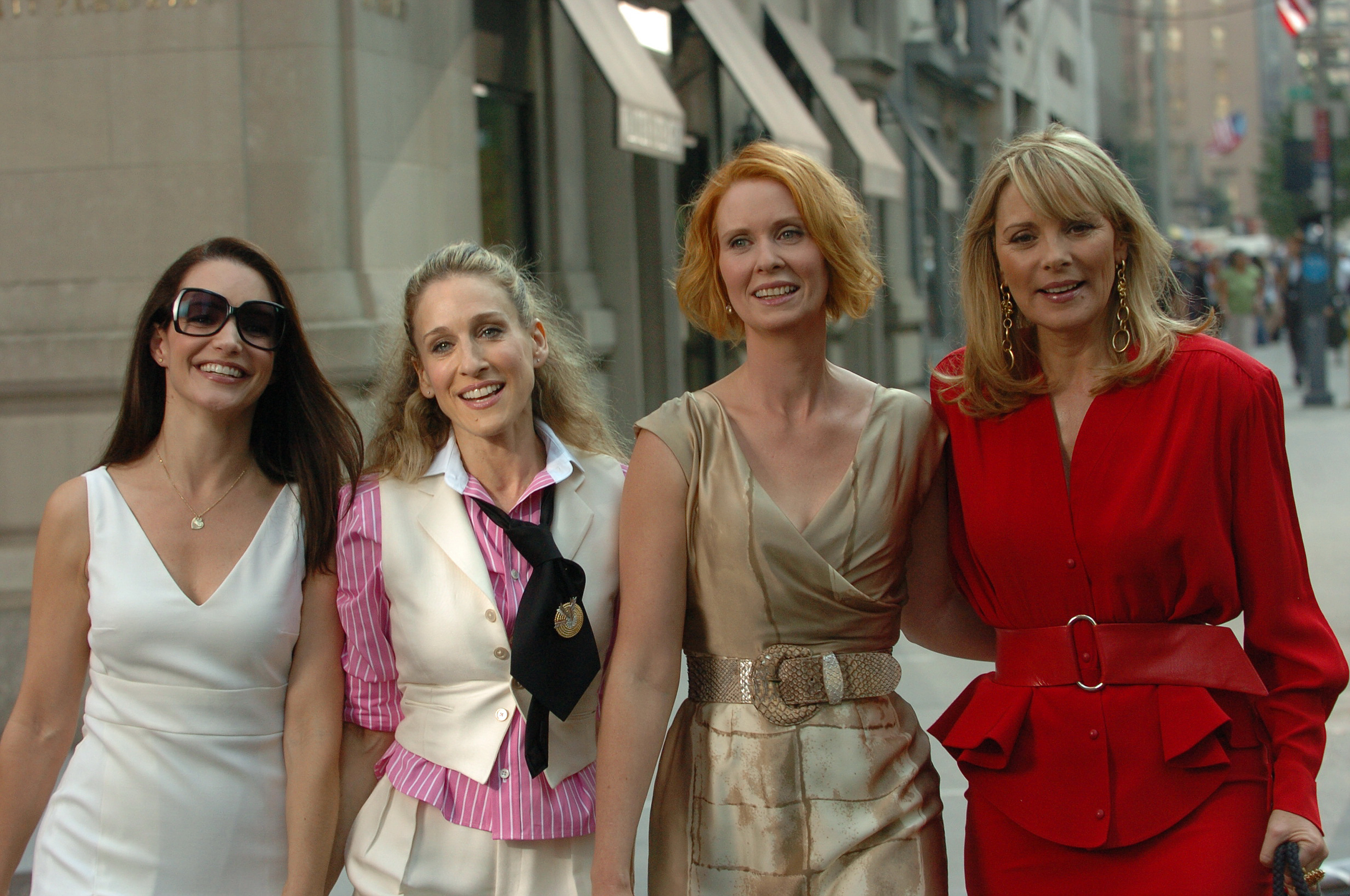 Kristin Davis, Sarah Jessica Parker, Cynthia Nixon and Kim Cattrall walk down the street on Park Avenue while filming 'Sex and the City: The Movie' in 2008