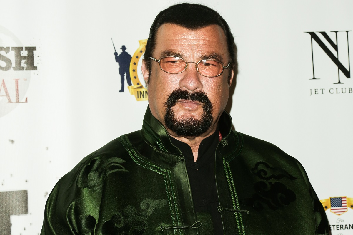 Steven Seagal wearing glasses while posing