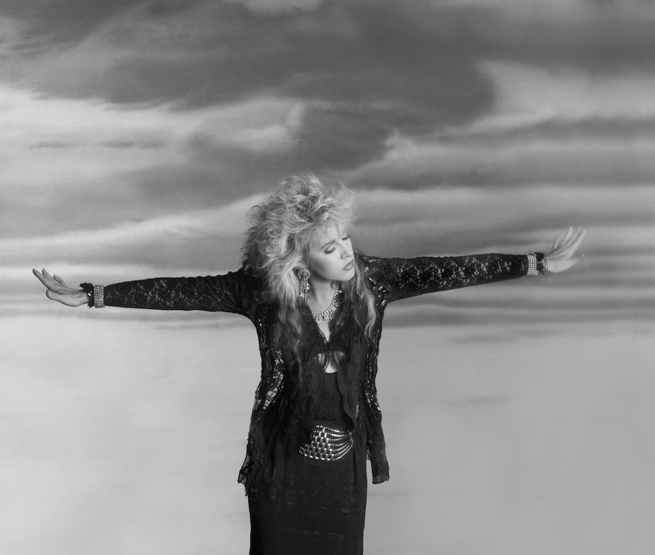Stevie Nicks wearing black, posing for the camera in LA, 1982.