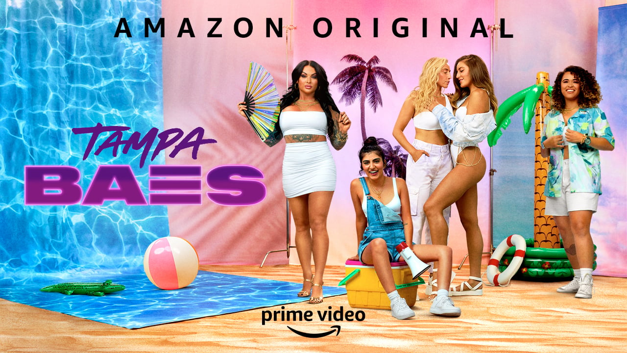 Cuppie Bragg, Haley Grable, Brianna Murphy, Mack McKenzie, and Shiva Pishdad pose together on a fake beach for 'Tampa Baes'.