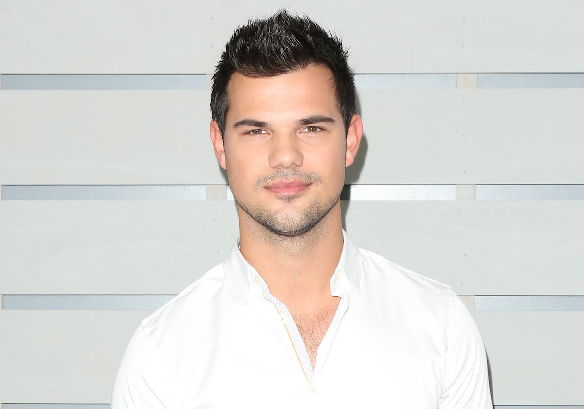 Newly engaged actor Taylor Lautner wears a white shirt