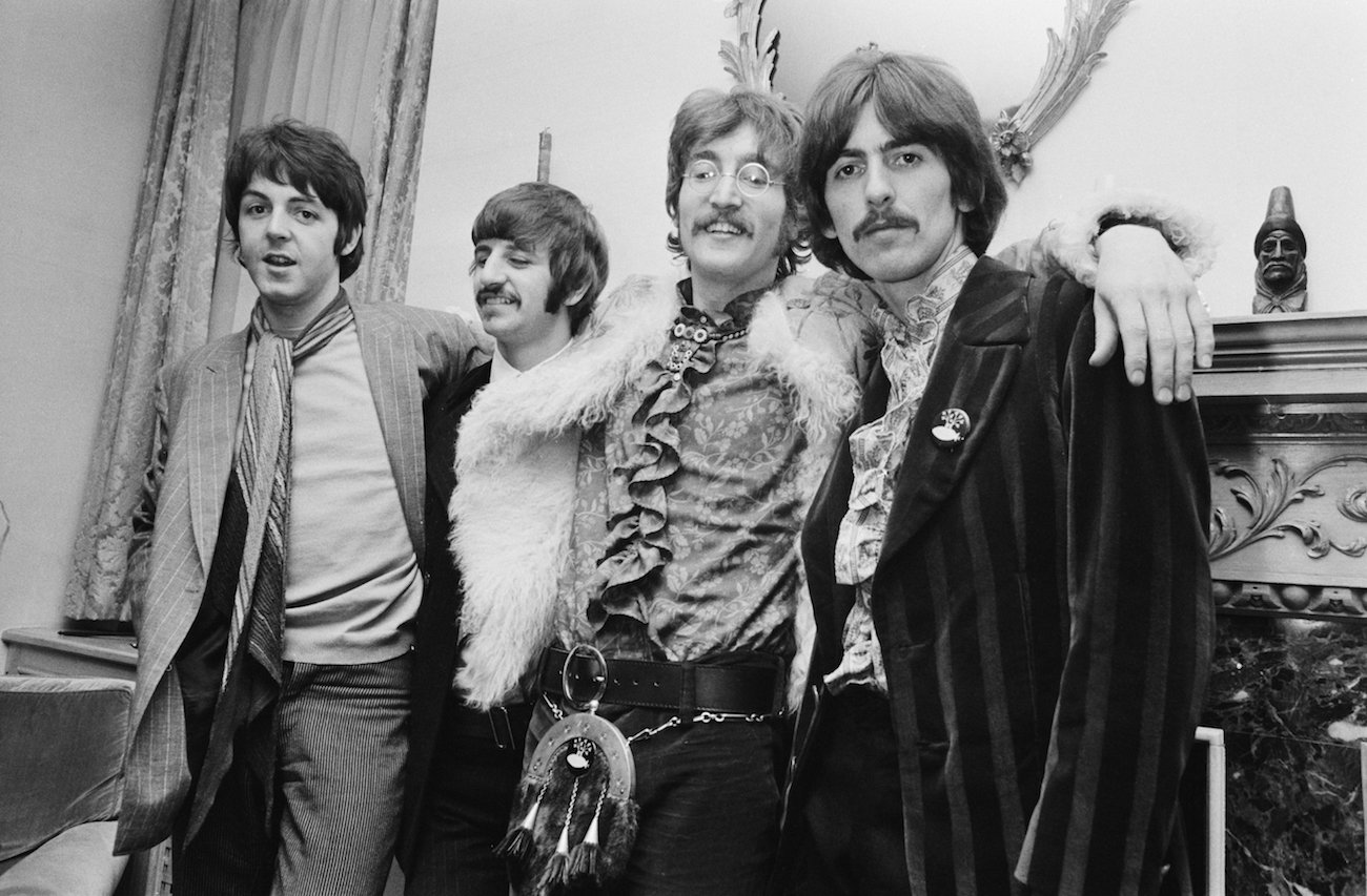George Harrison and The Beatles at a press launch for 'Sgt. Pepper's Lonely Hearts Club Band' in 1967.