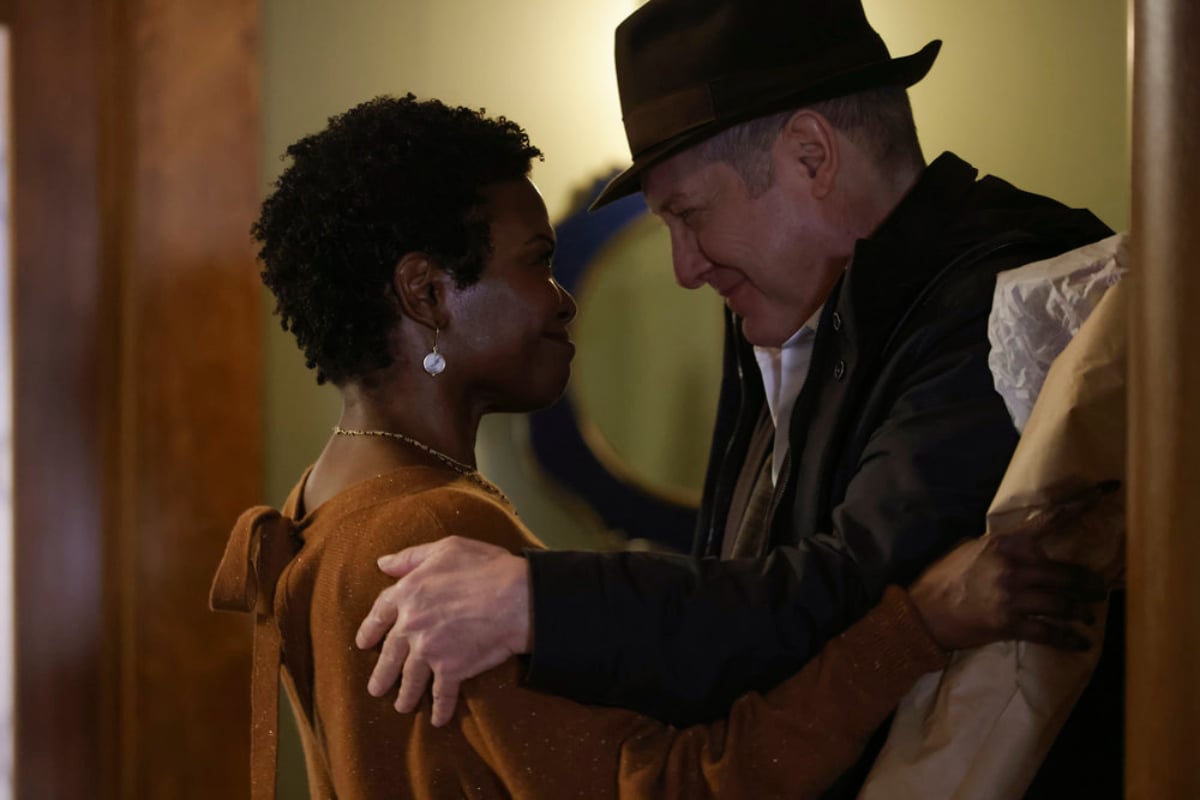 LaChanze as Anne and James Spader as Raymond "Red" Reddington in The Blacklist. The couple hold each other and smile.