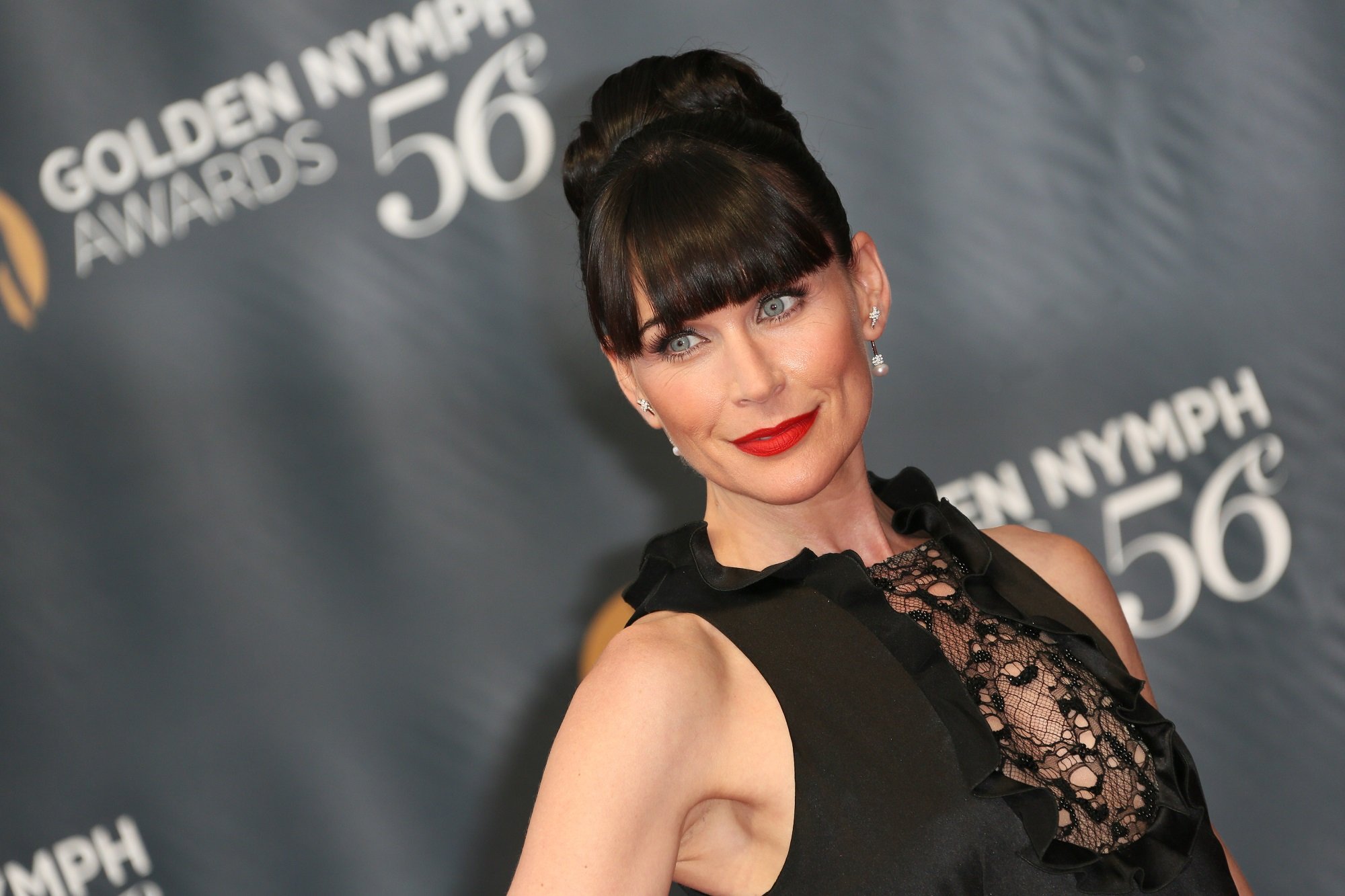 The Bold and the Beautiful speculation focuses on Quinn, pictured here in a black sleeveless dress.
