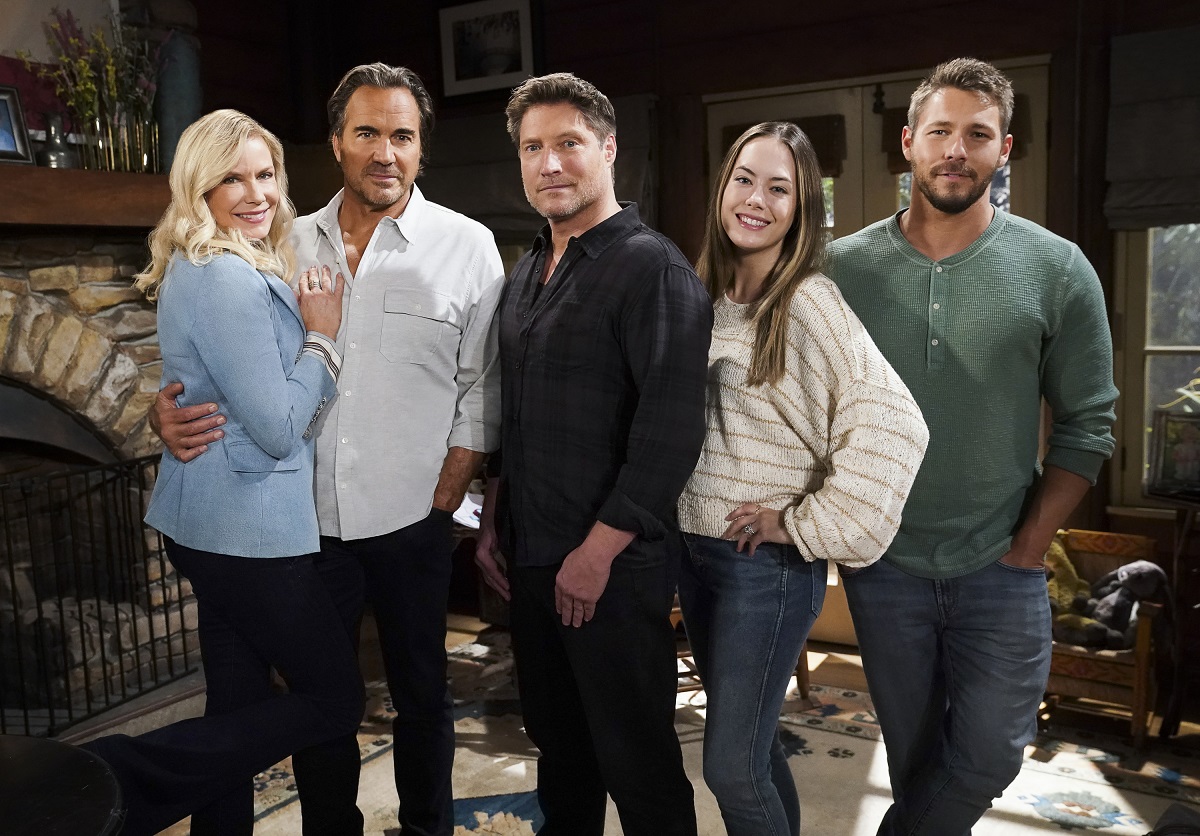 'The Bold and the Beautiful' actors Katherine Kelly Lang, Thorsten Kaye, Sean Kanan, Annika Noelle, and Scott Clifton pose for a group photo in a cabin set.