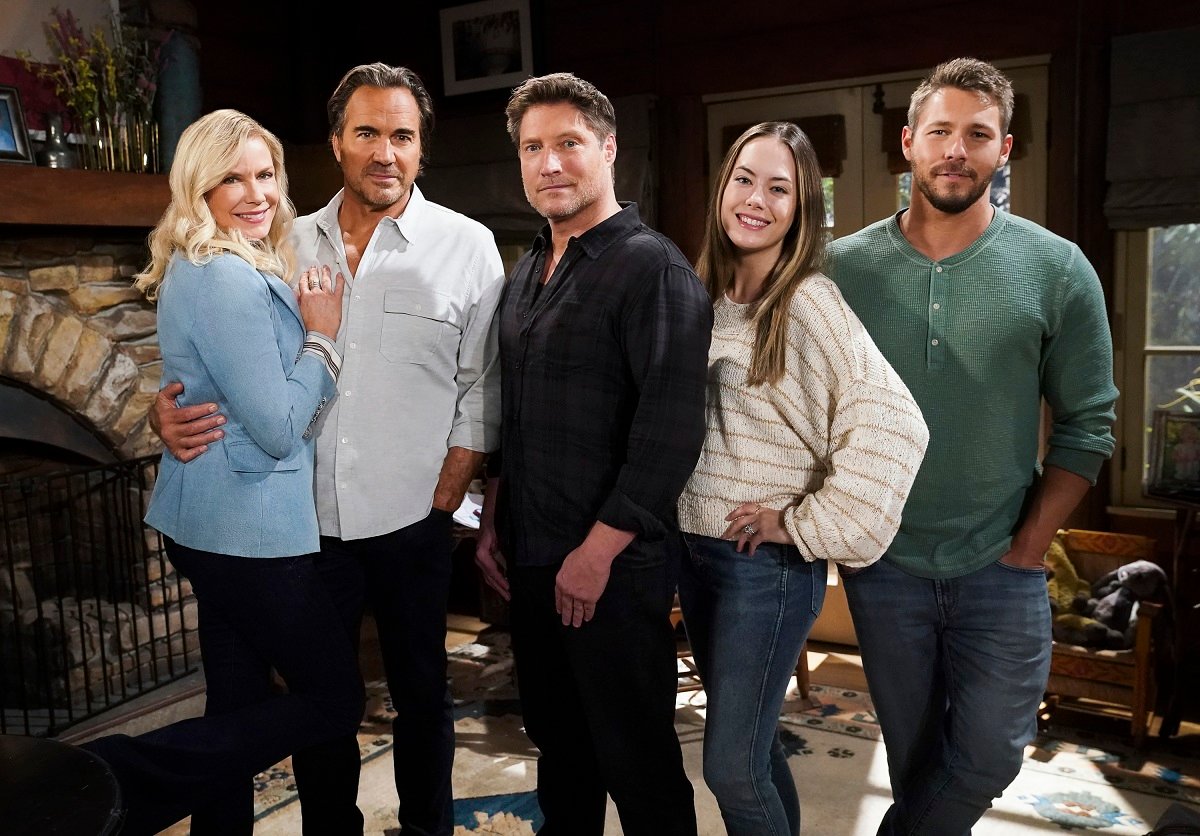 'The Bold and the Beautiful' actors Katherine Kelly Lang, Thorsten Kaye, Sean Kanan, Annika Noelle, and Scott Clifton pose for a group photo in a cabin set.