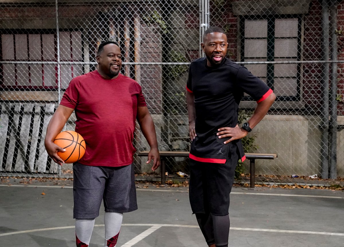 Cedric the Entertainer and Sheaun McKinney as Calvin and Malcolm Butler from 'The Neighborhood'