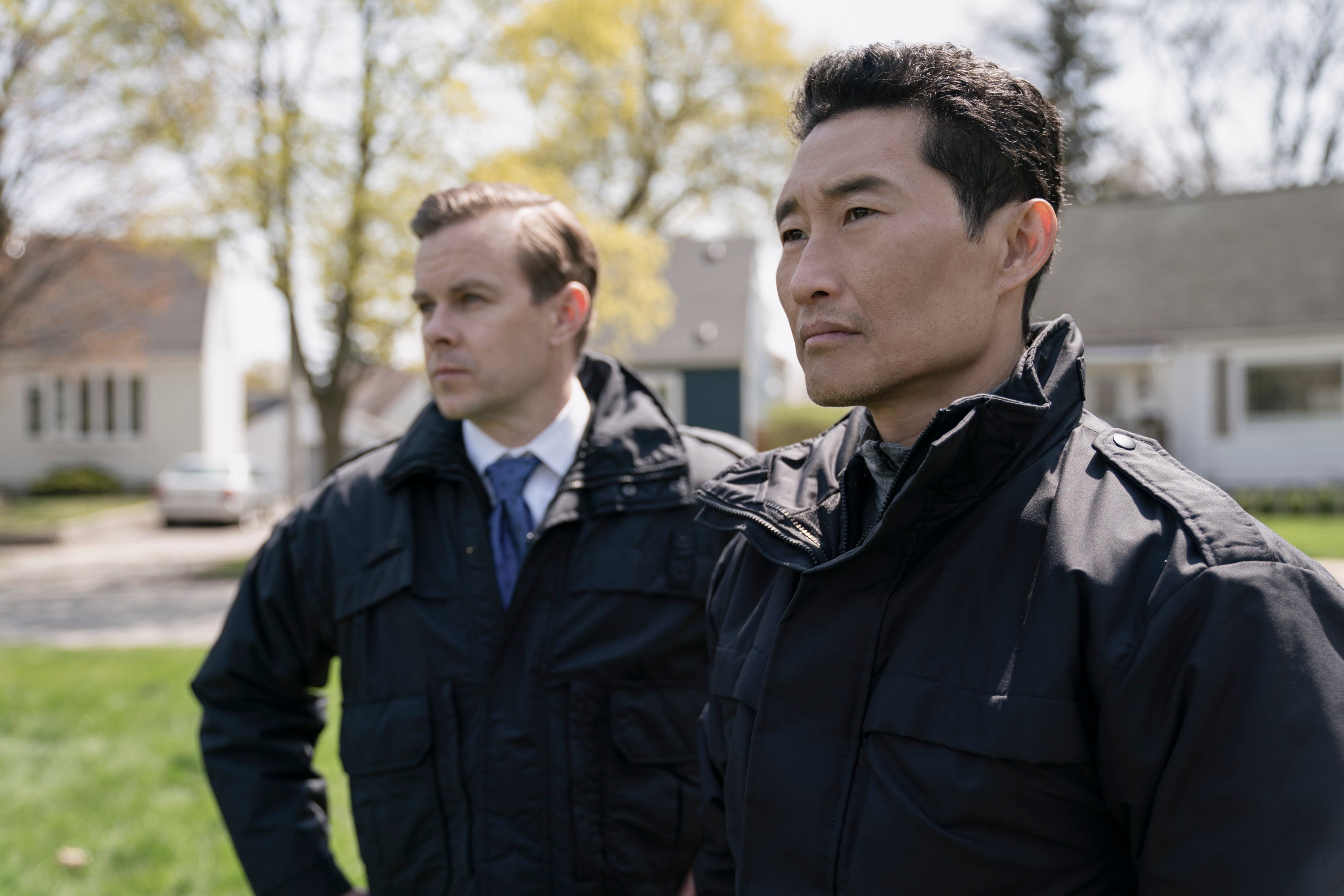 Morgan Kelly and Daniel Dae Kim, standing outside and wearing jackets, in 'The Hot Zone: Anthrax'