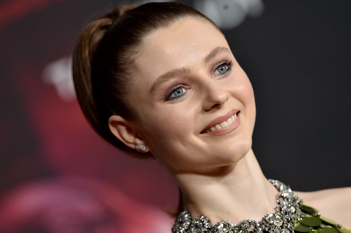 Thomasin McKenzie headshot with hair in bun