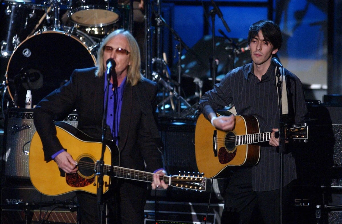 Tom Petty and Dhani Harrison performing during George Harrison's Rock & Roll Hall of Fame induction, 2004.