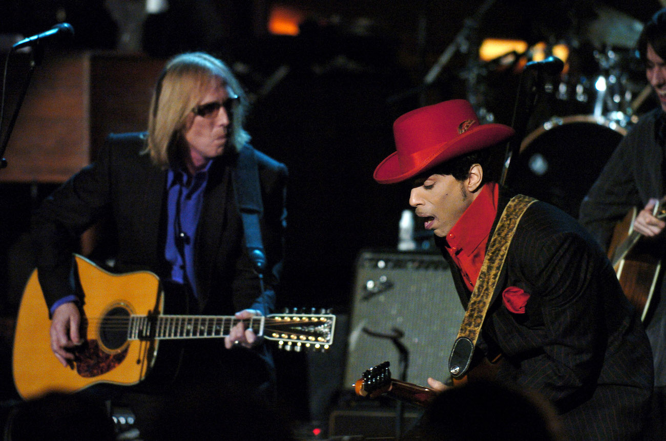 Tom Petty and Prince performing during George Harrison's Rock & Roll Hall of Fame induction in 2004. 