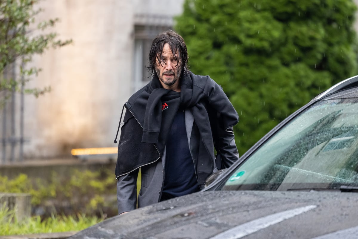 Keanu Reeves is seen leaving his hotel to go to the set of "John Wick: Chapter 4"