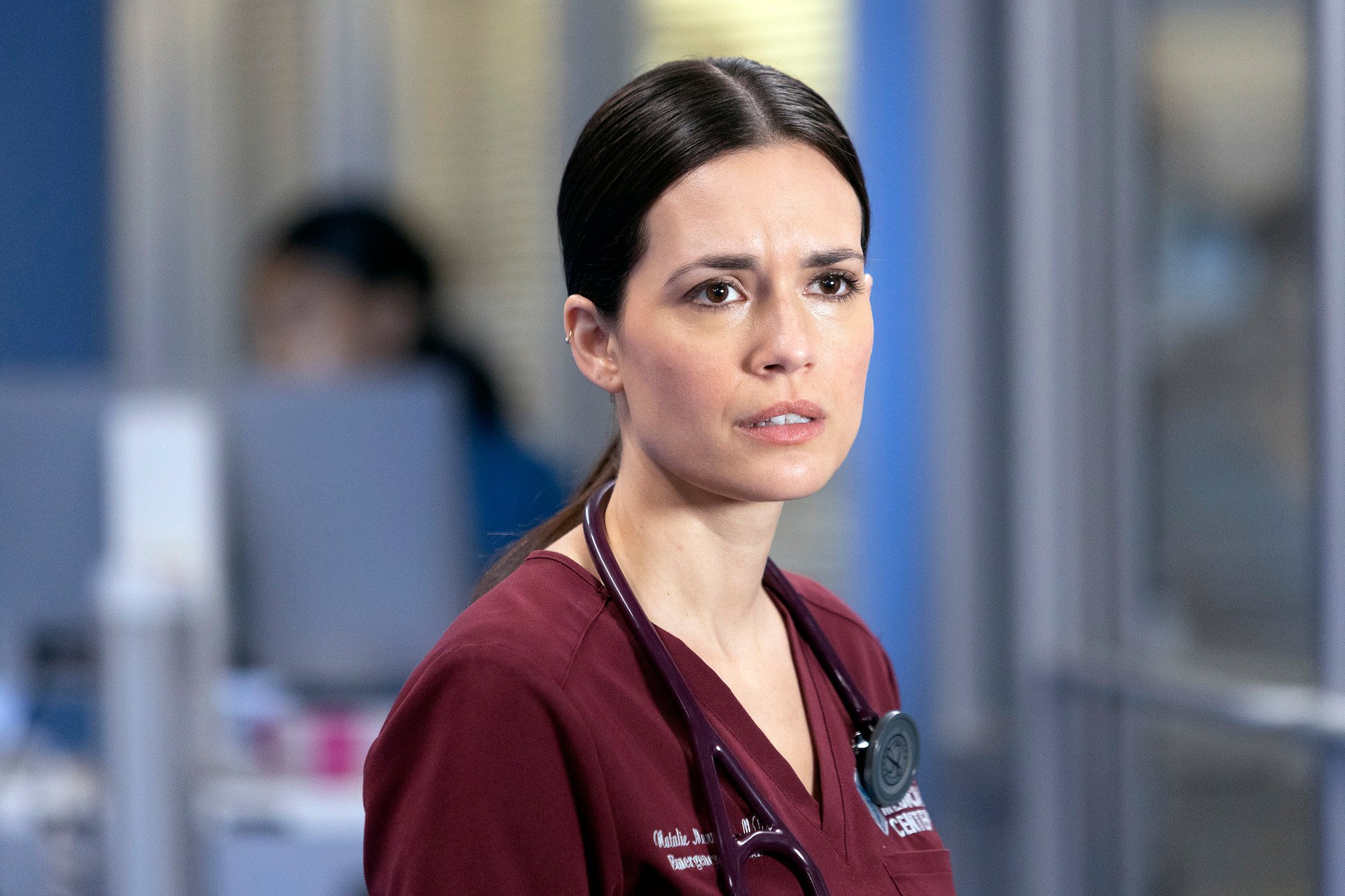 Torrey DeVitto wearing hospital scrubs in 'Chicago Med.'