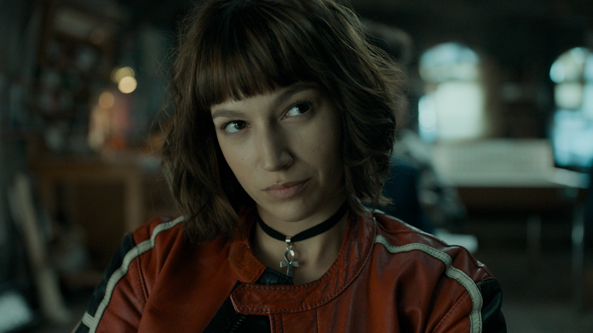 Úrsula Corberó wearing a red jumpsuit in 'Money Heist' Season 1.