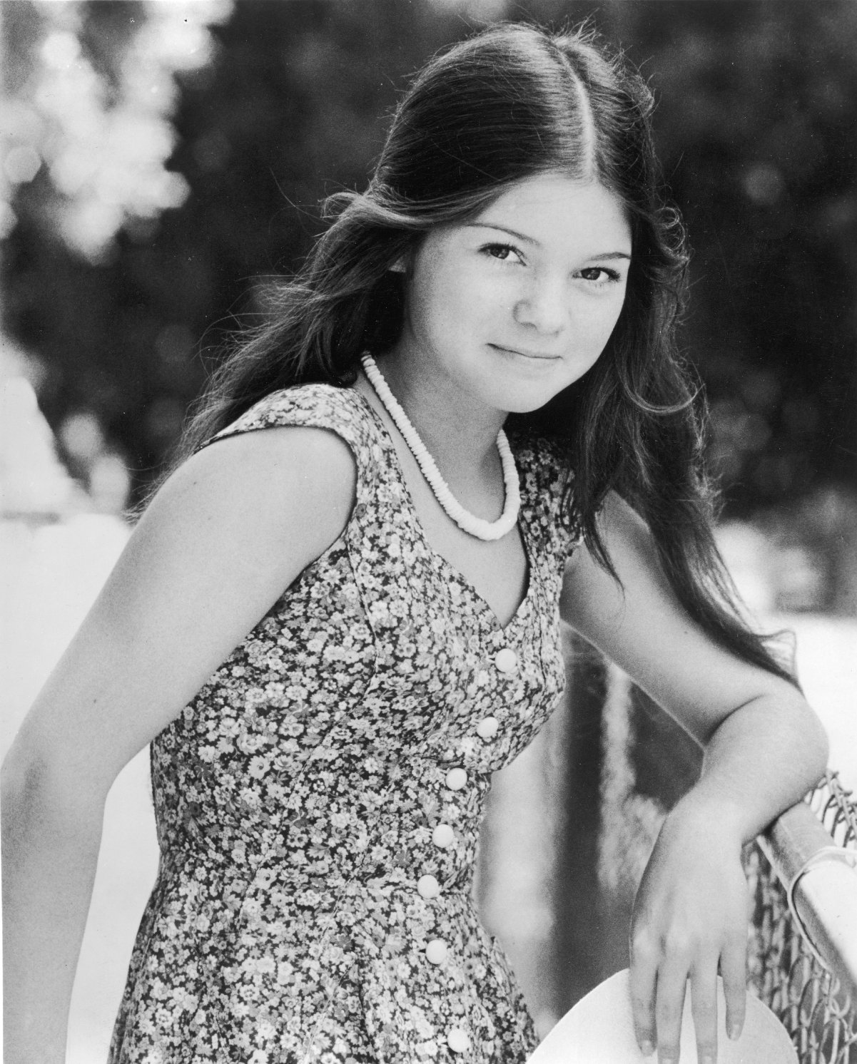 'One Day at a Time' actor Valerie Bertinelli smiling in a floral dress in 1975, age 15