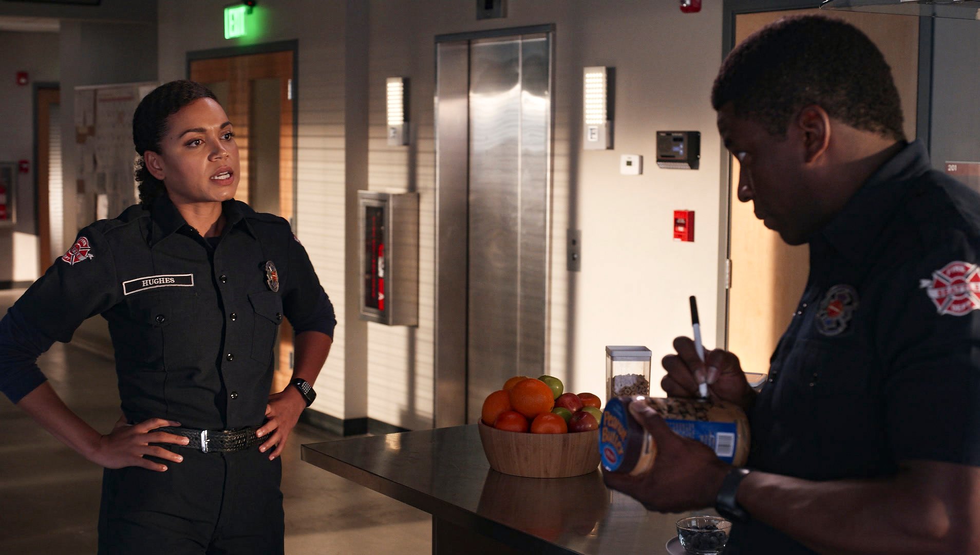 Barrett Doss as Victoria ‘Vic’ Hughes and Okieriete 'Oak' Onaodowan as Dean Miller share a conversation together in ‘Station 19’ Season 5 Episode 5, the ‘Grey’s Anatomy’ Season 18 crossover