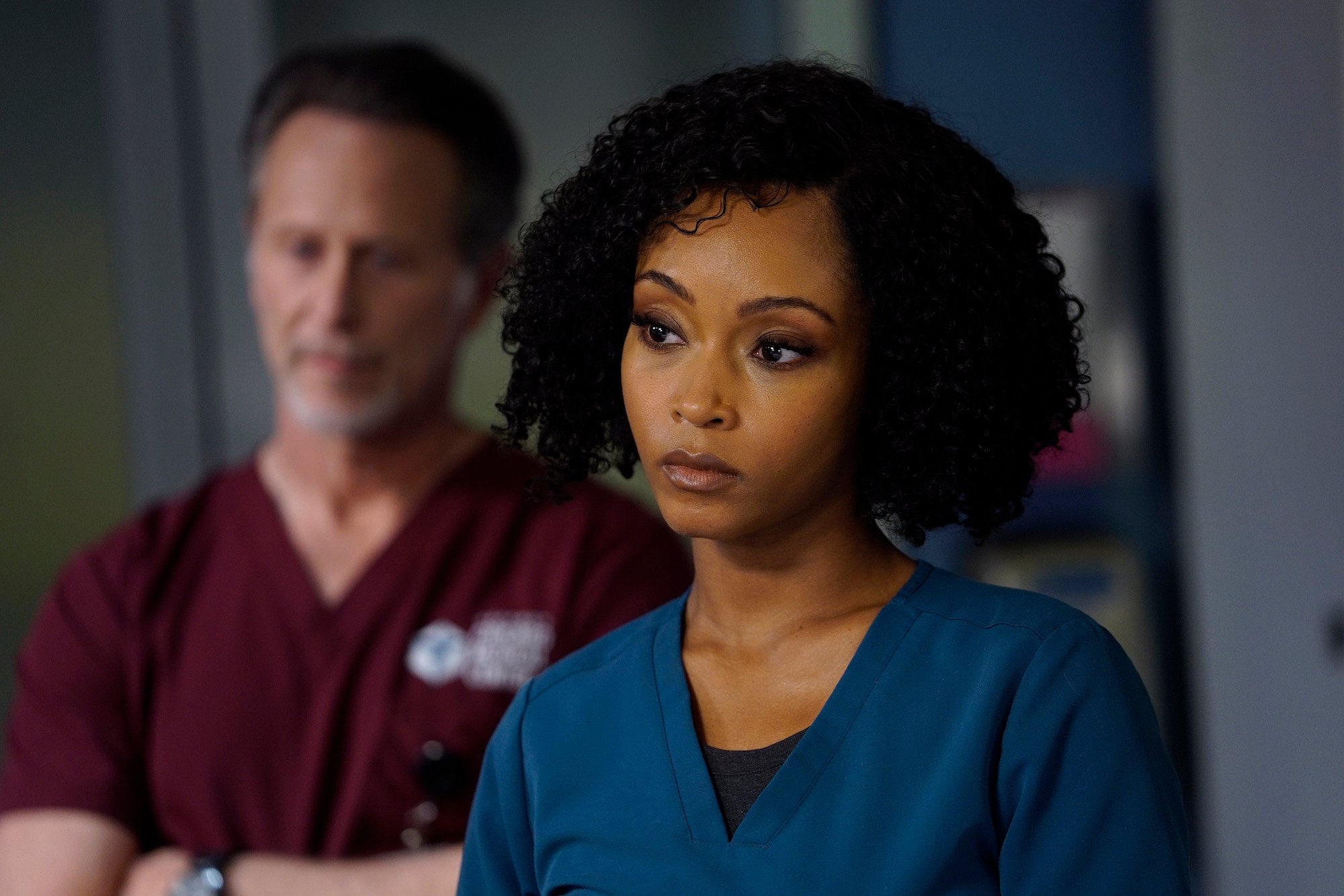 Yaya DaCosta dressed in blue scrubs in NBC's 'Chicago Med.'