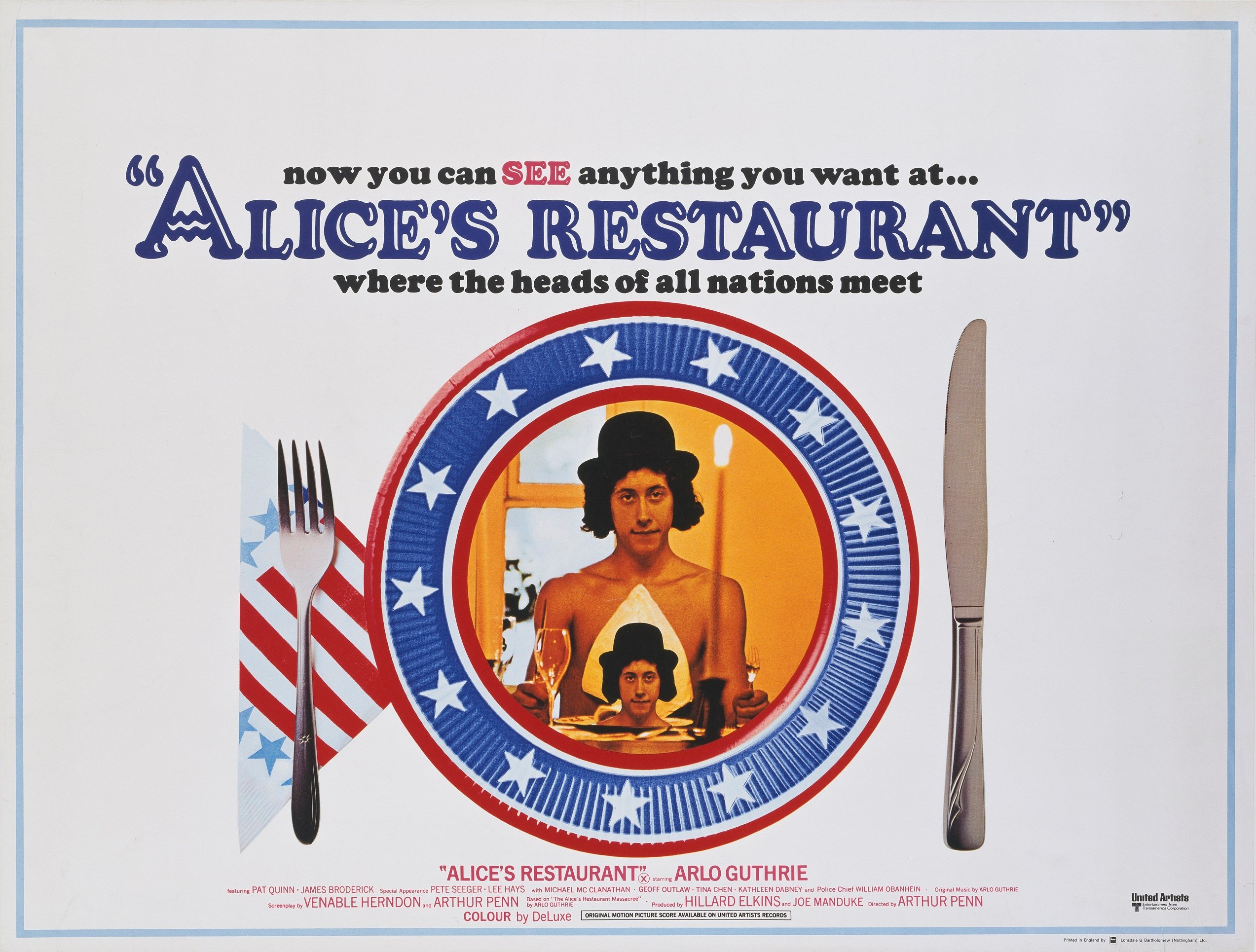 Arlo Guthrie at a place setting on a poster for 'Alice's Restaurant,' the film version of his classic Thanksgiving song