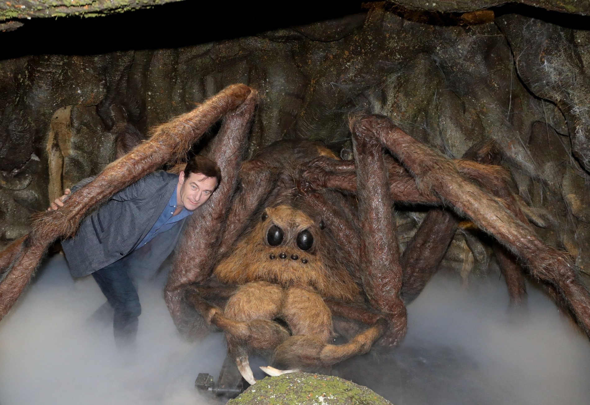 Jason Isaacs with a replica of Aragog from 'Harry Potter' at Warner Bros. London