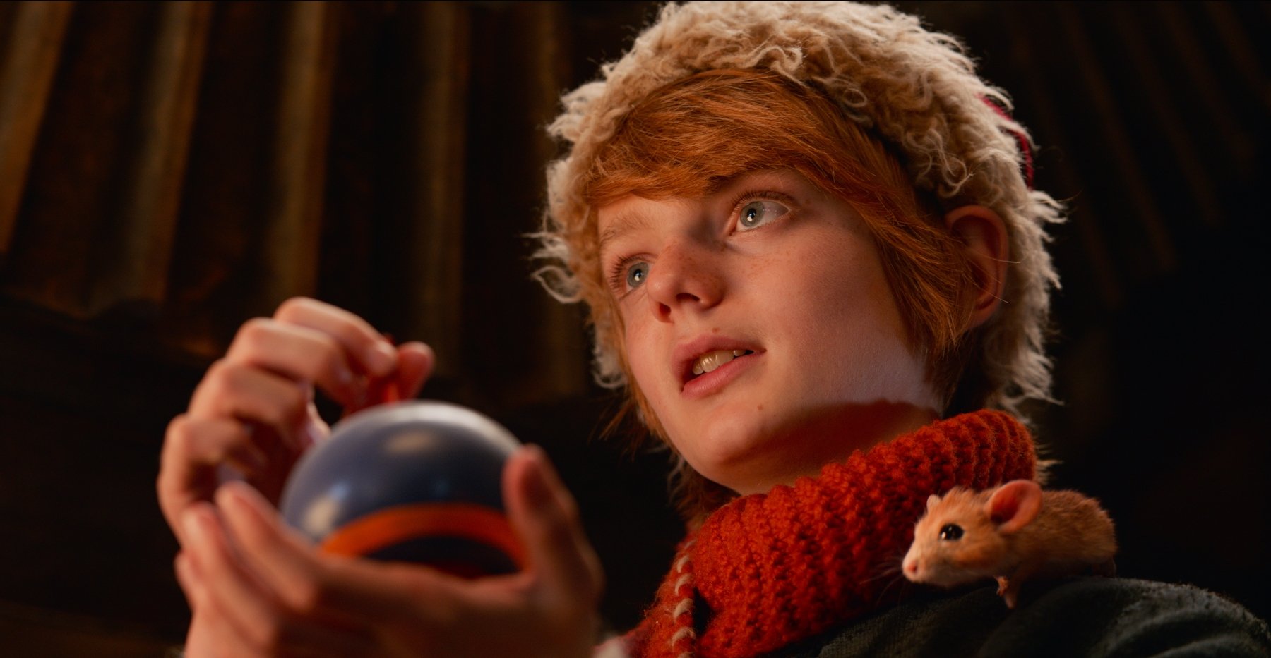 Nikolas holding a toy in 'A Boy Called Christmas'