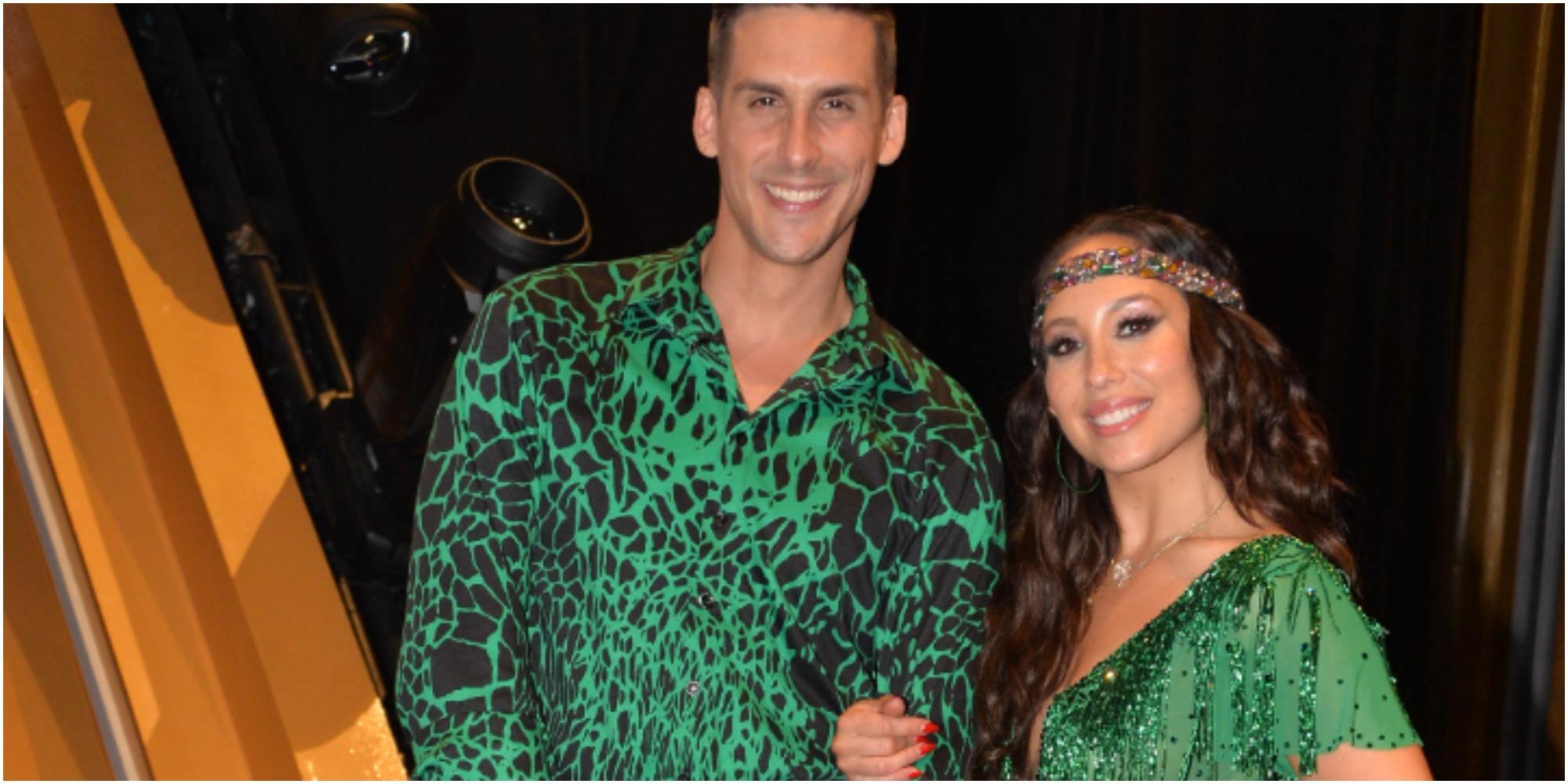 Cody Rigsby and Cheryl Burke pose in the "DWTS" ballroom for Queen Night.