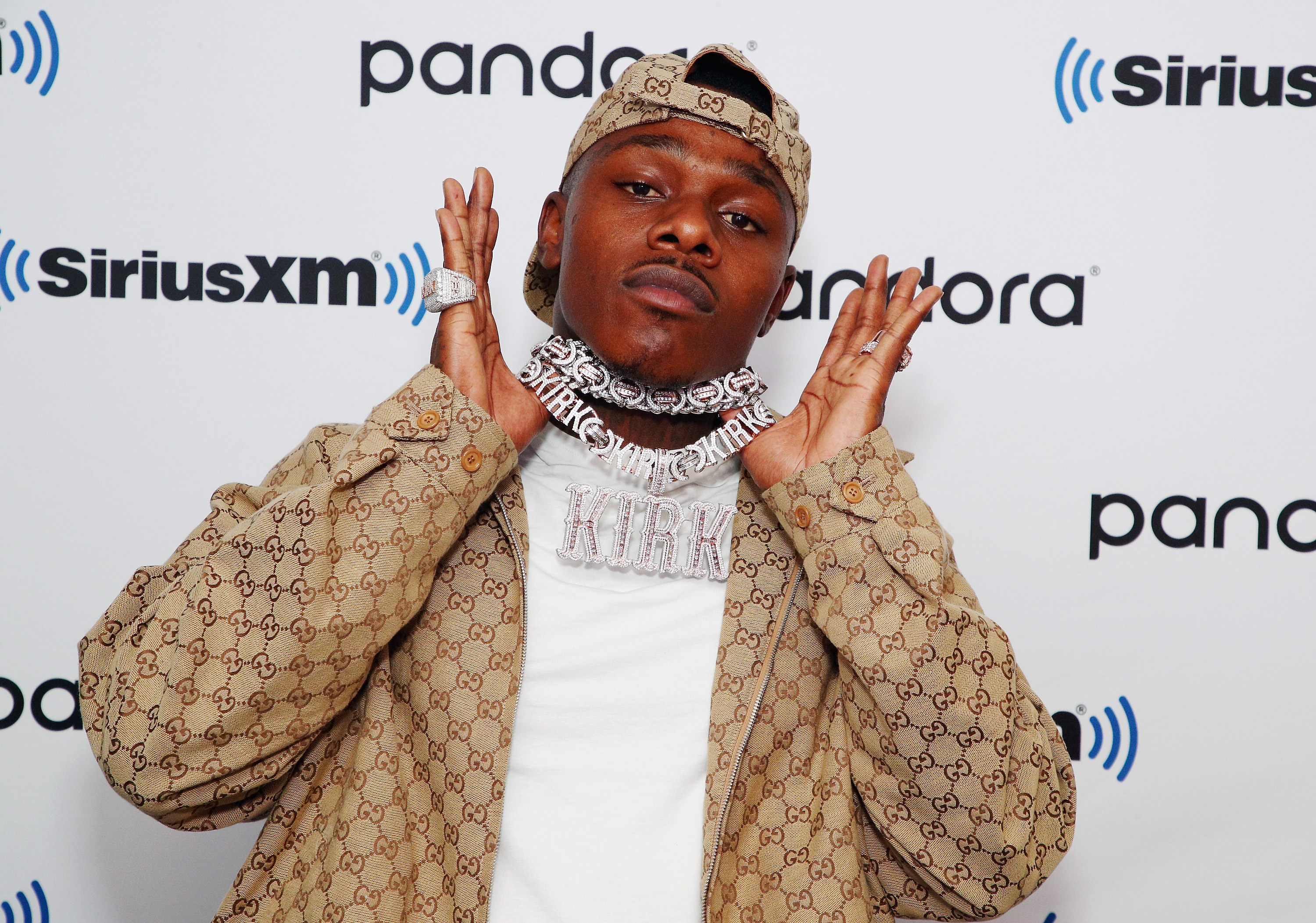 DaBaby wearing a necklace