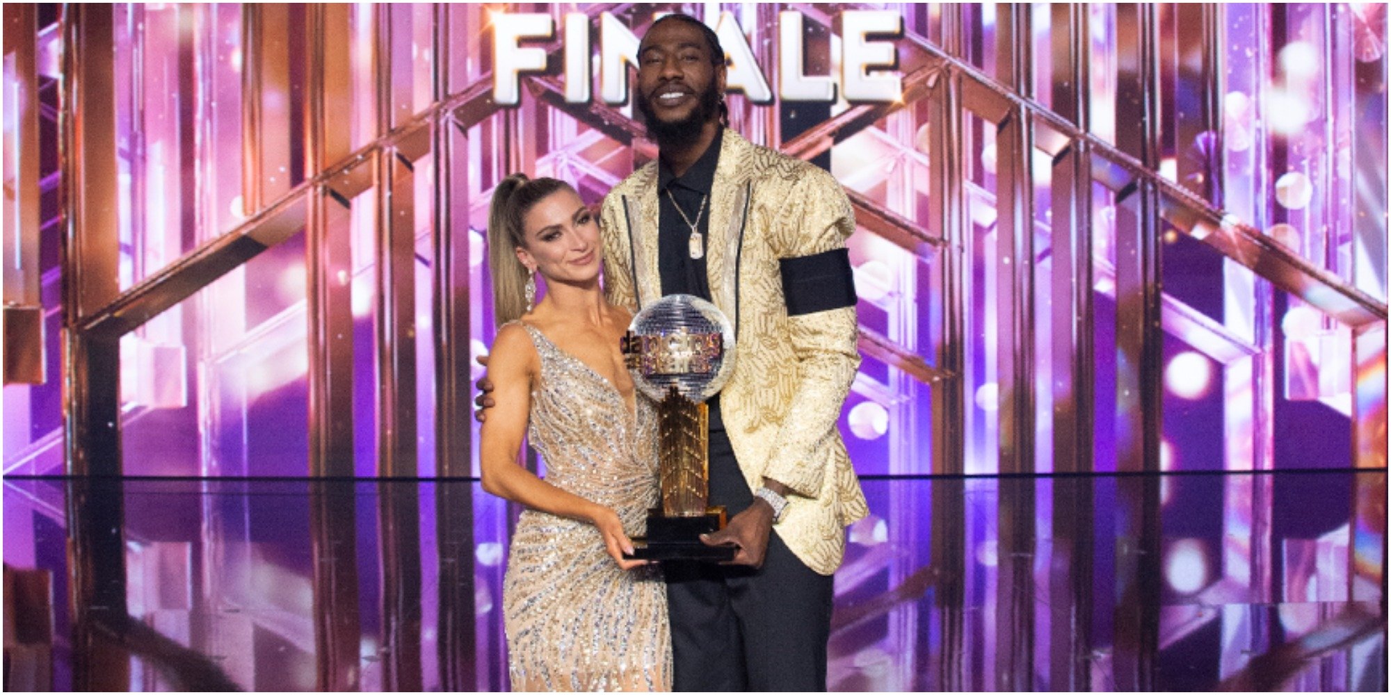 Iman Shumpert and Daniella Karagach pose with mirrorball on Dancing with the Stars.