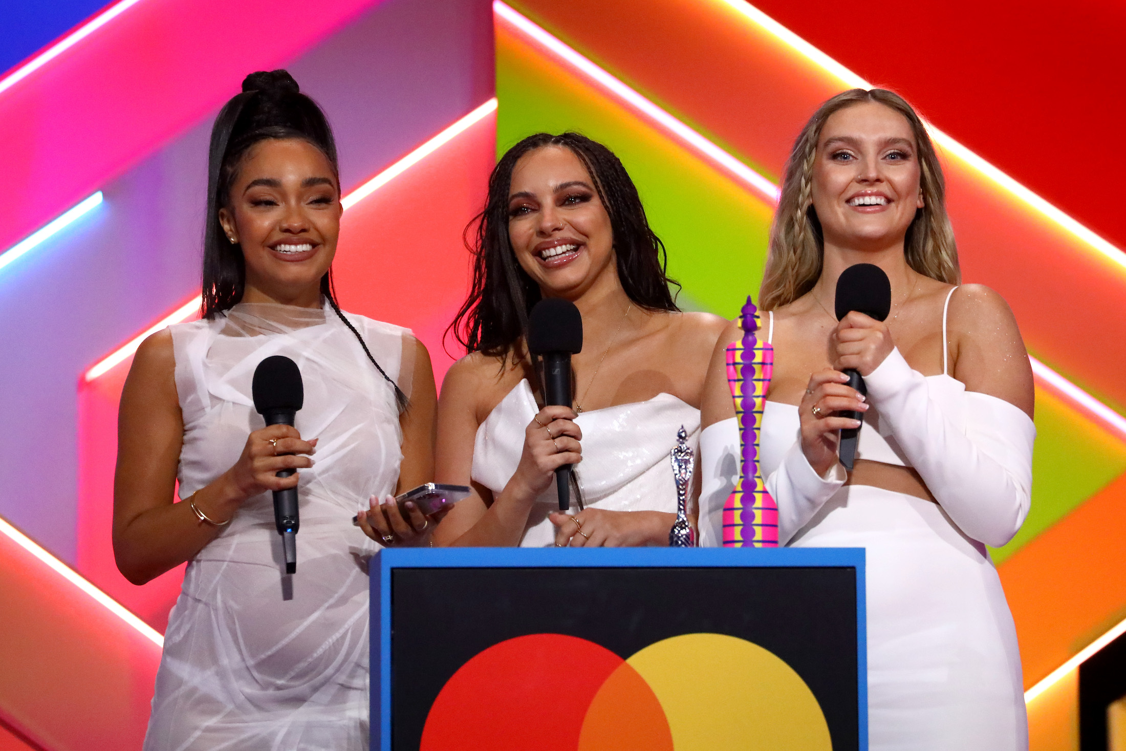 Leigh-Anne Pinnock, Jade Thirlwall and Perrie Edwards of Little Mix presenting an award