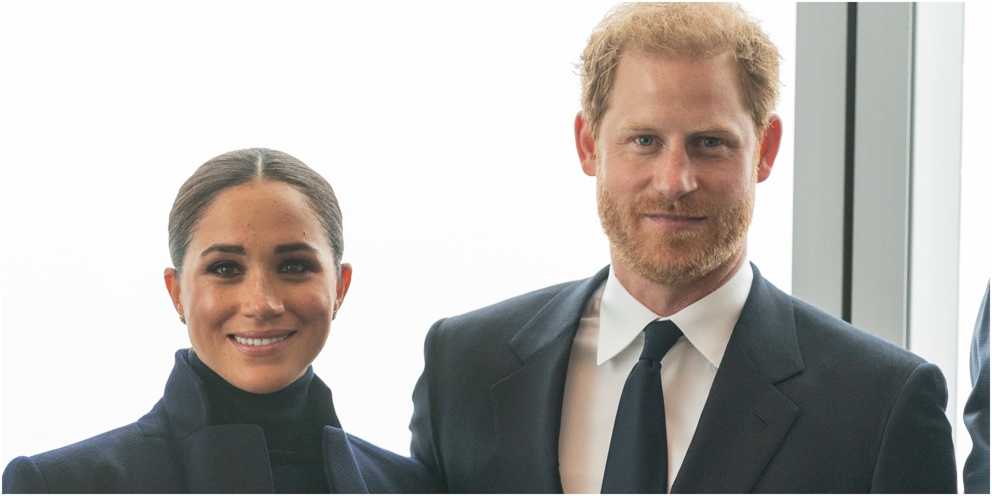 Meghan Markle and Prince Harry pose for a photo op in New York City.