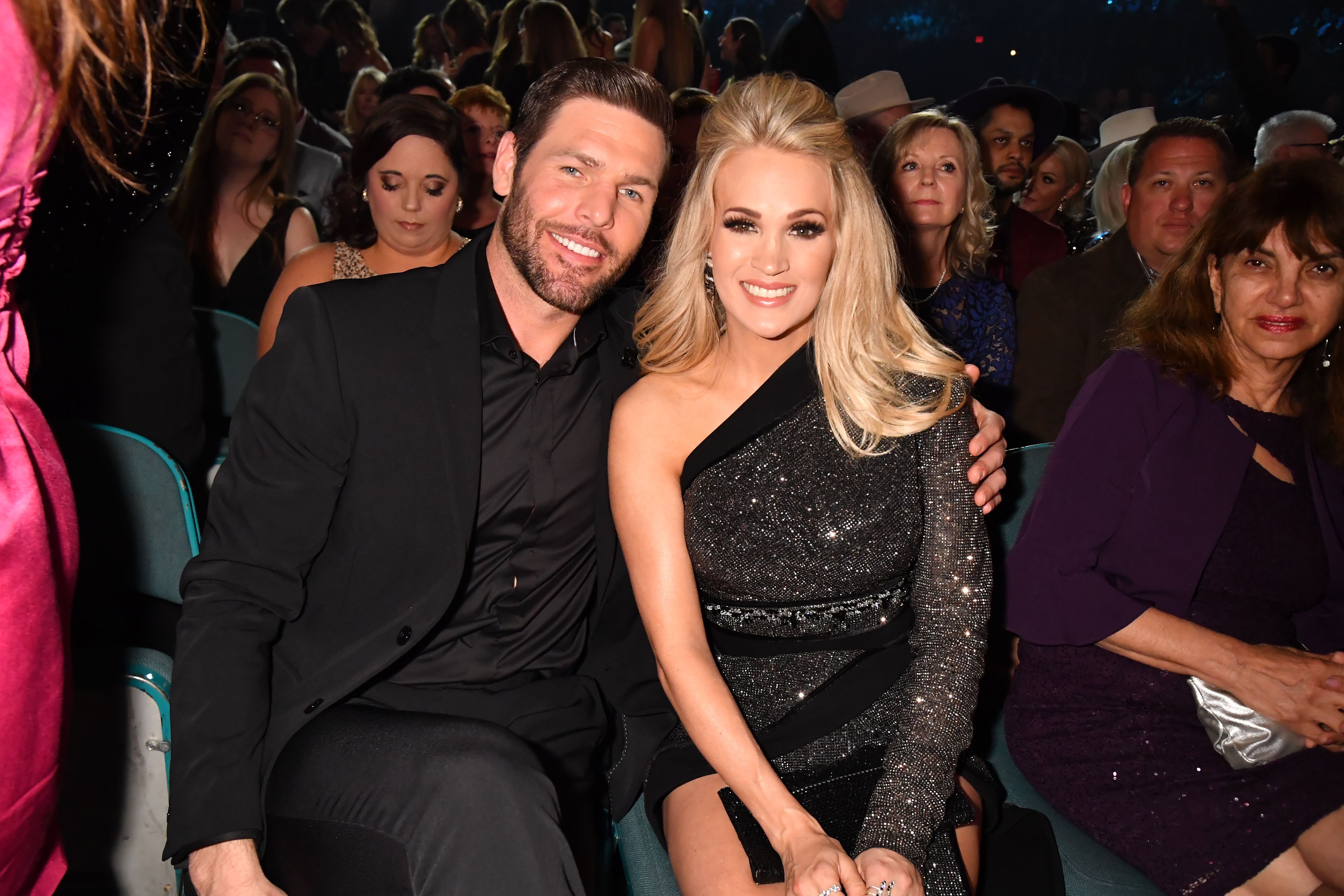 Mike Fisher and Carrie Underwood smiling