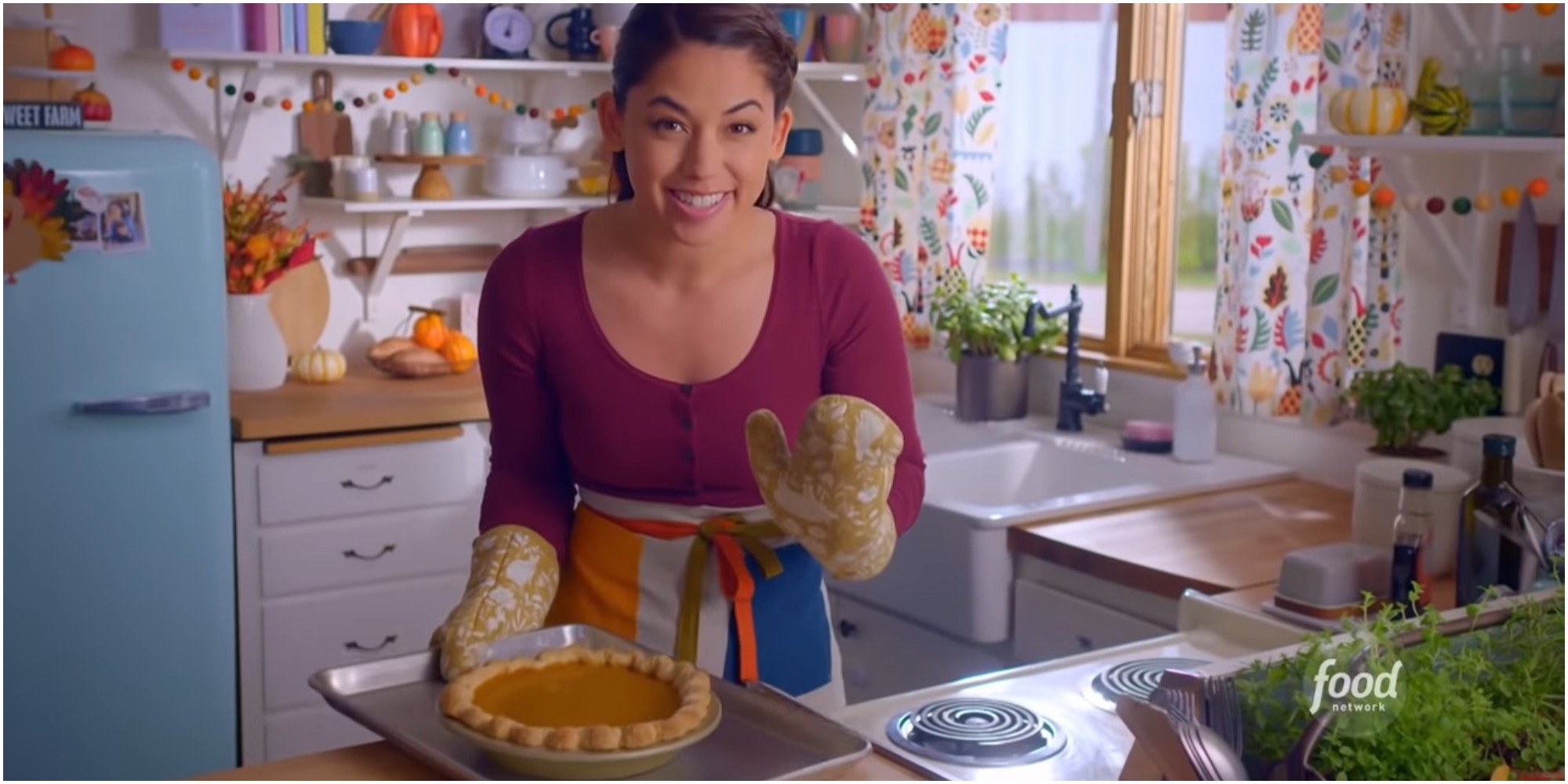 Molly Yeh poses with her recipe for Pumpkin Pie with Whipped Cream and Cinnamon.