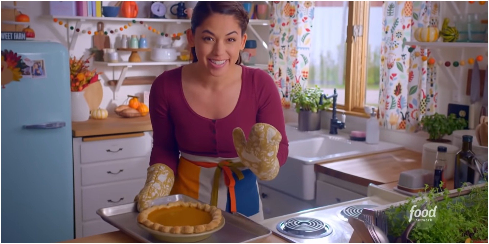 Molly Yeh poses with her recipe for Pumpkin Pie with Whipped Cream and Cinnamon.