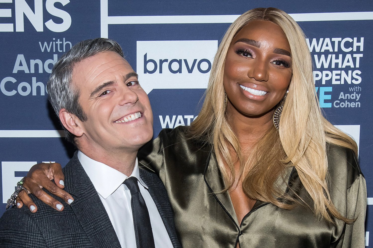 Andy Cohen and Nene Leakes smiling