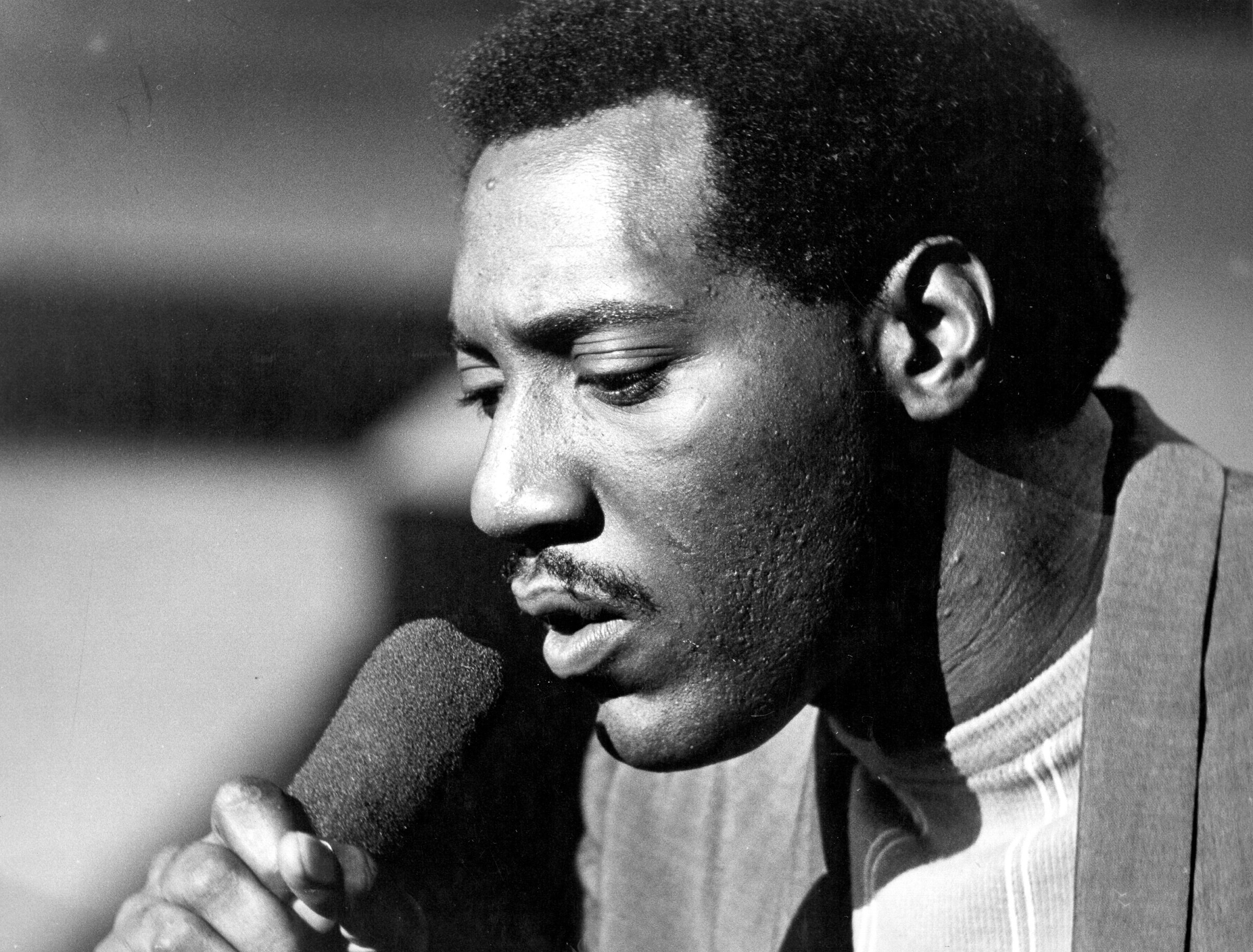 Otis Redding with a microphone